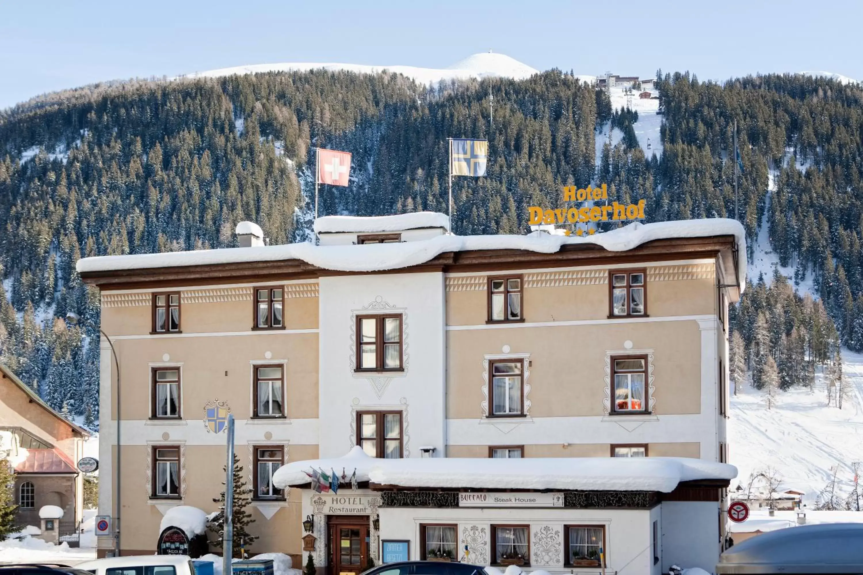 Facade/entrance, Winter in Hotel Davoserhof