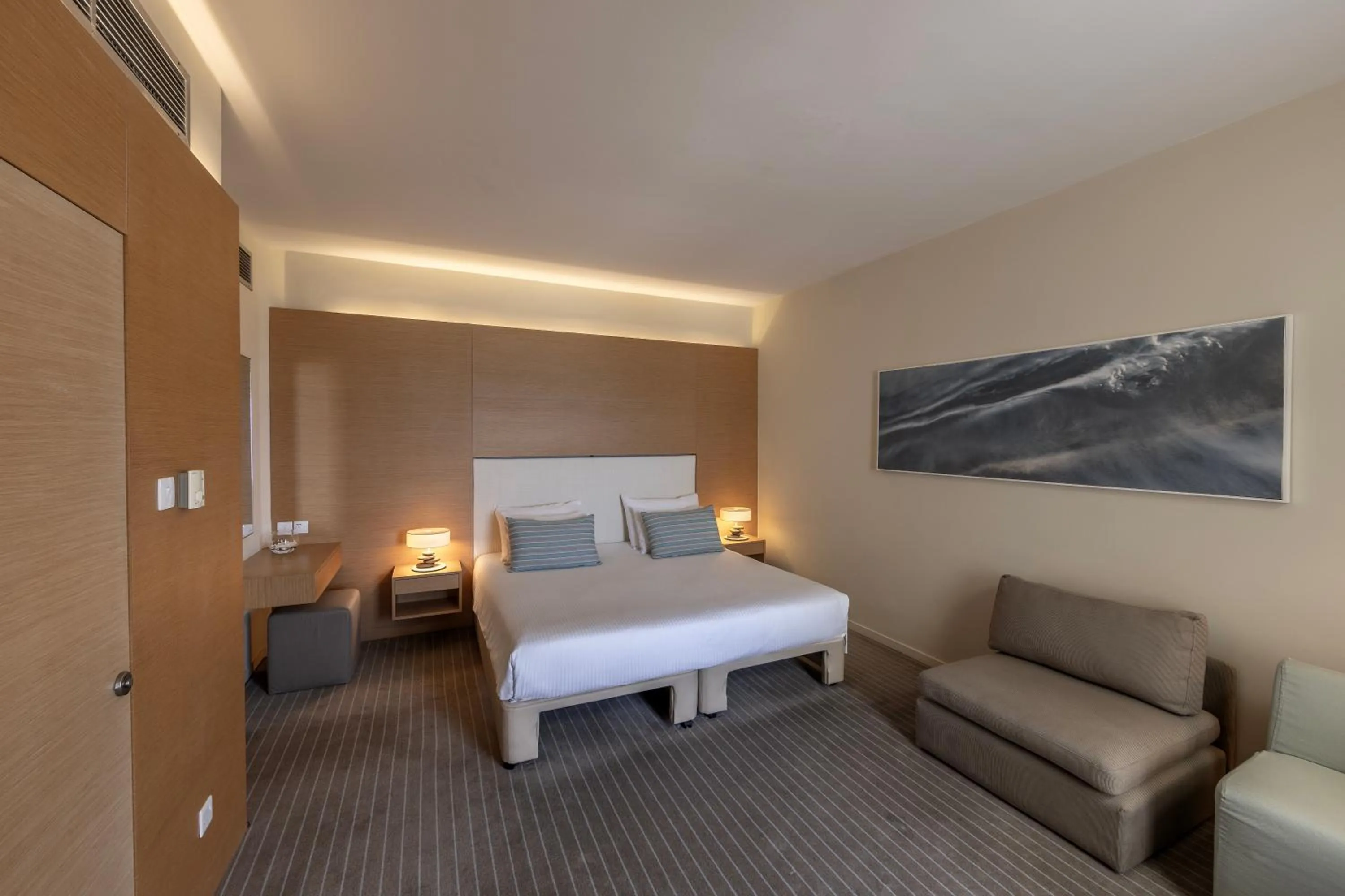 Bed in Capo Bay Hotel