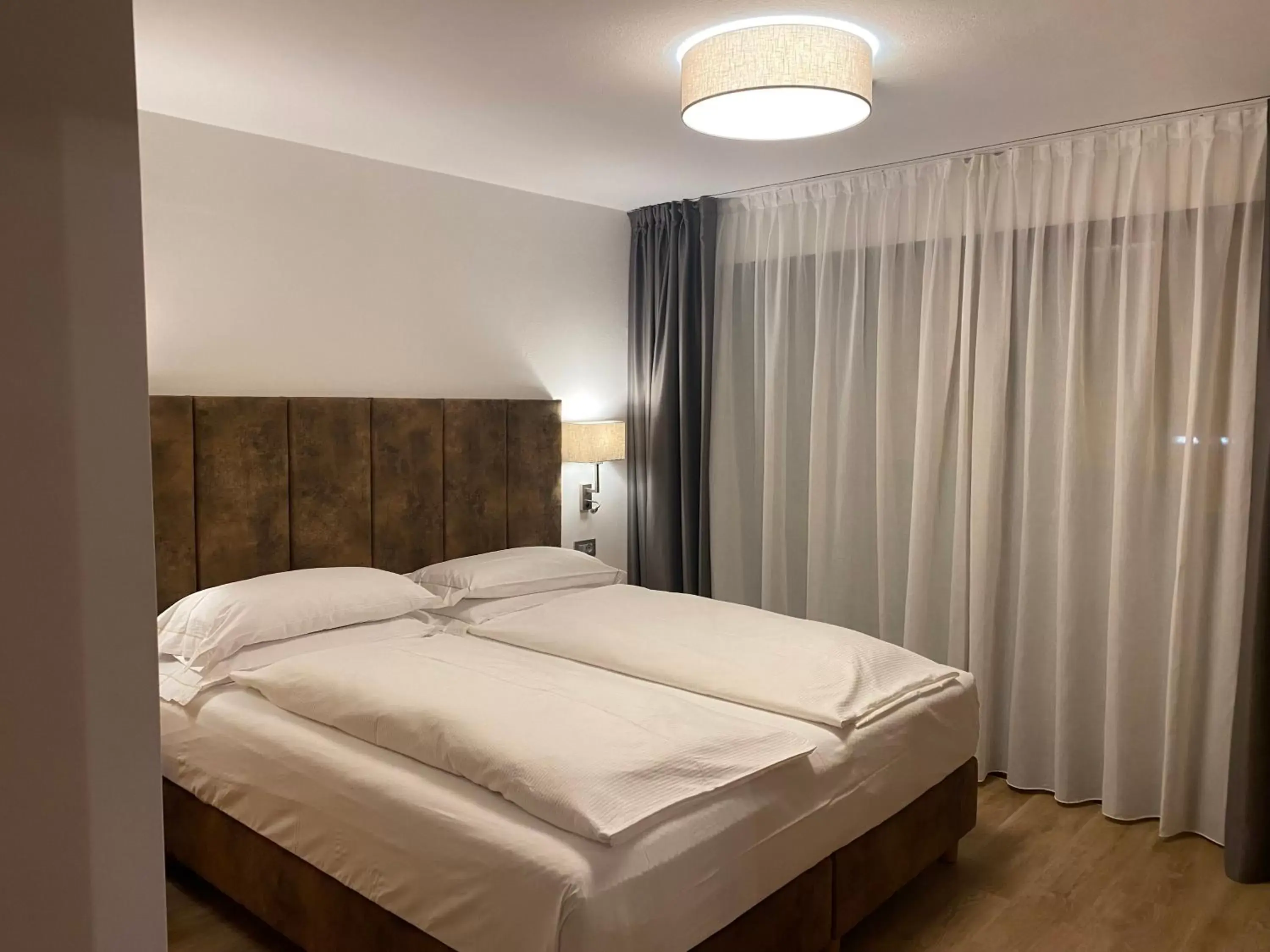 Bed in Hotel Europeo Alpine Charme & Wellness