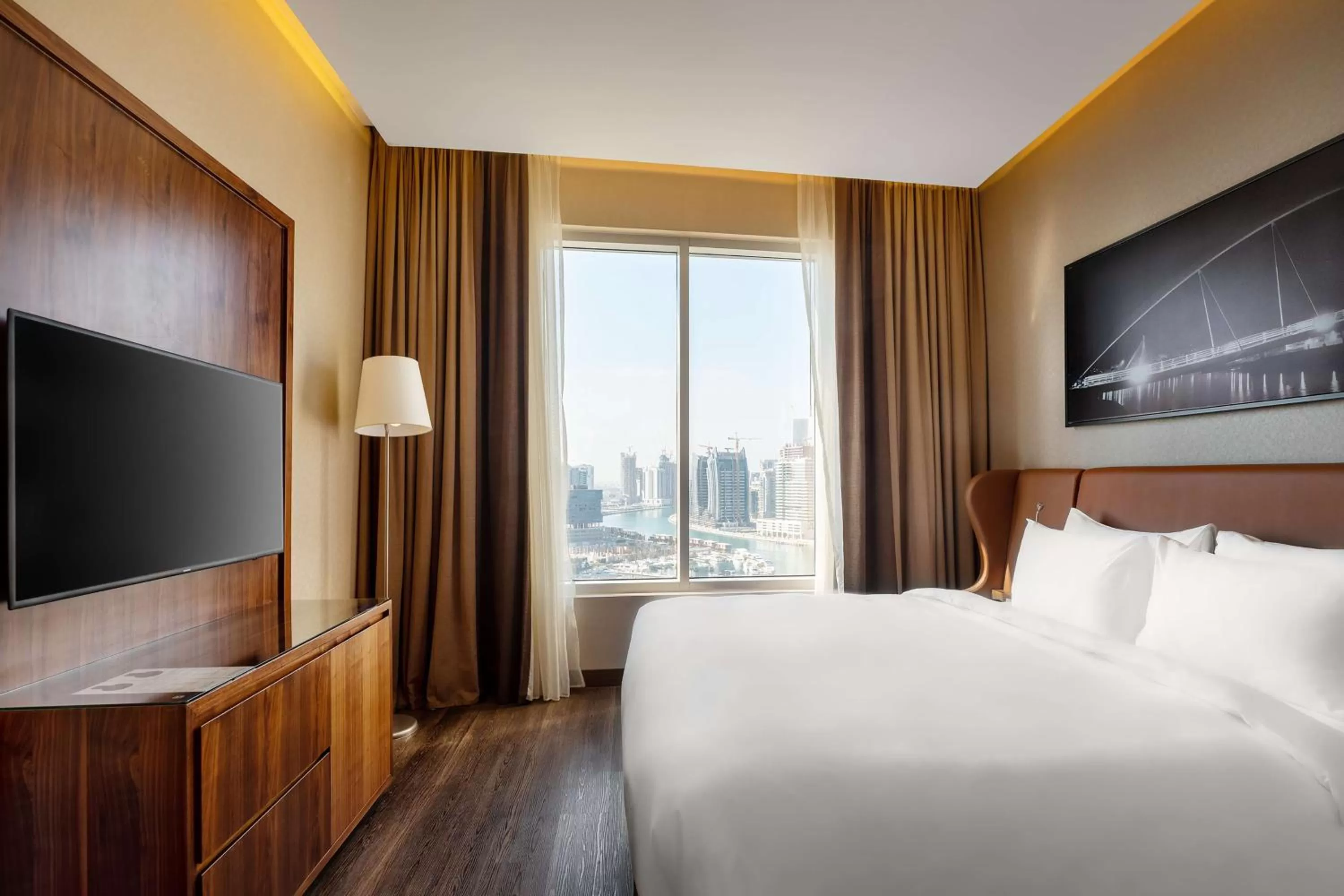 Photo of the whole room, Bed in Radisson Blu Hotel, Dubai Canal View