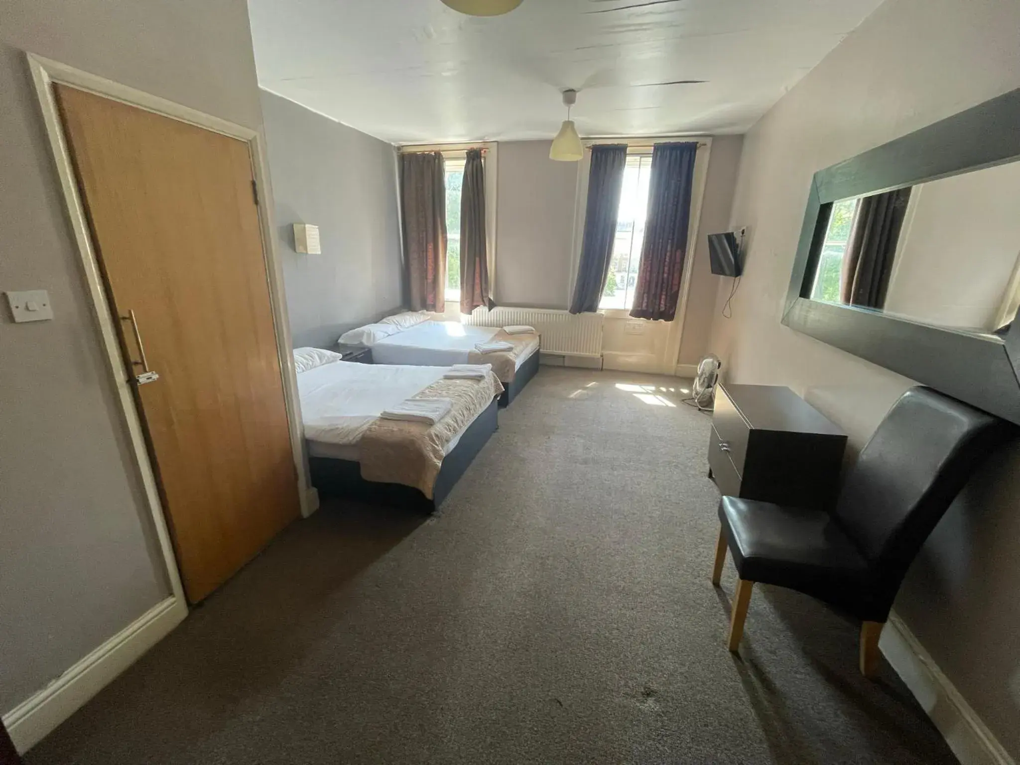 Bedroom in The Somerset Hotel