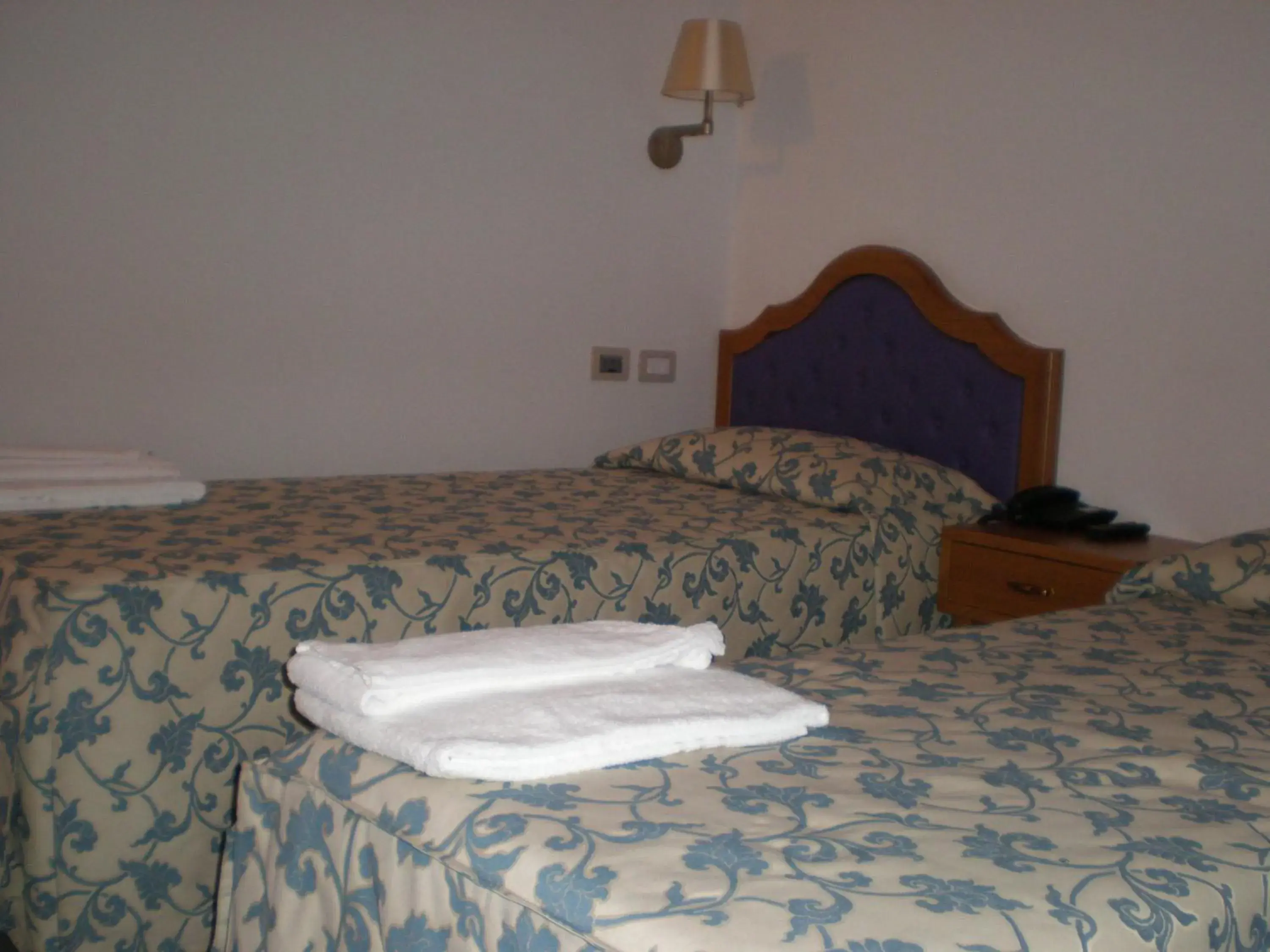 Bed in Villa Aretusi