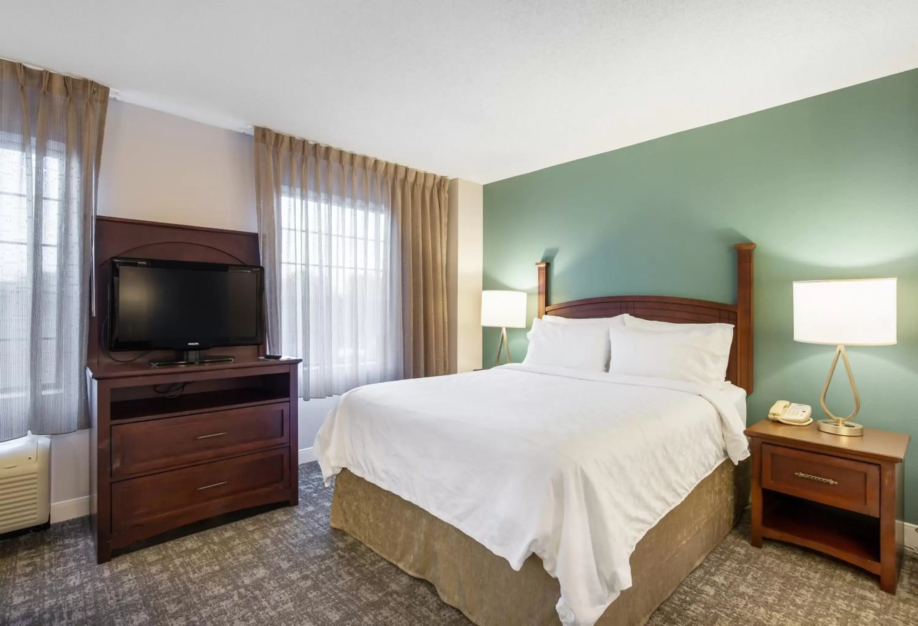 Bed in Staybridge Suites Chesapeake-Virginia Beach, an IHG Hotel