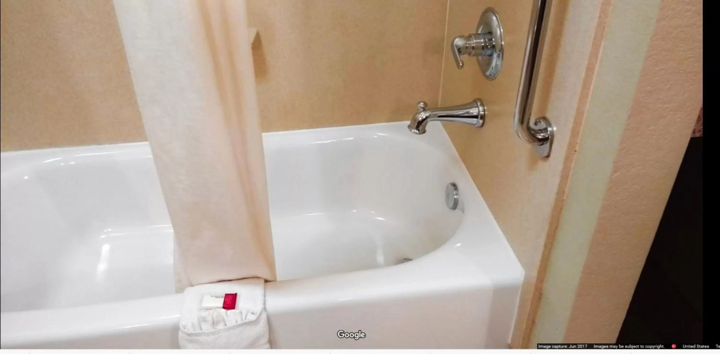 Bathroom in Days Inn & Suites by Wyndham Mineral Wells