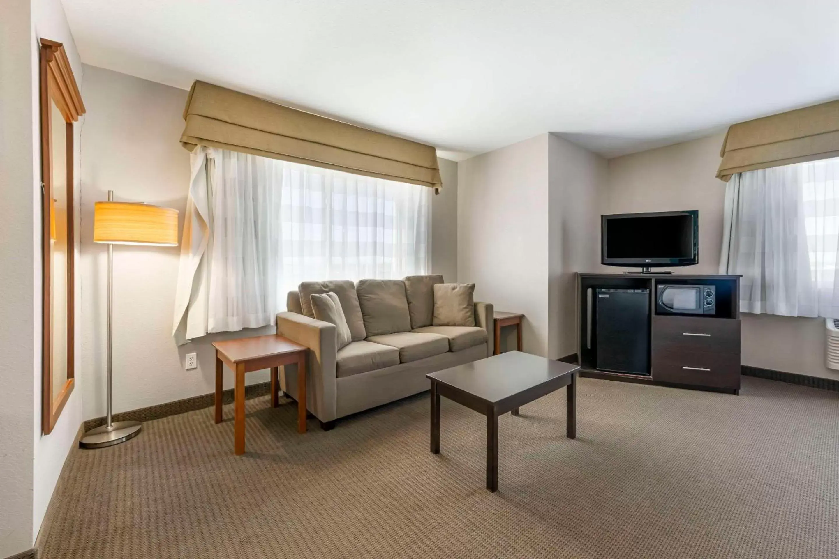 Bedroom, Seating Area in Sleep Inn & Suites Hays I-70