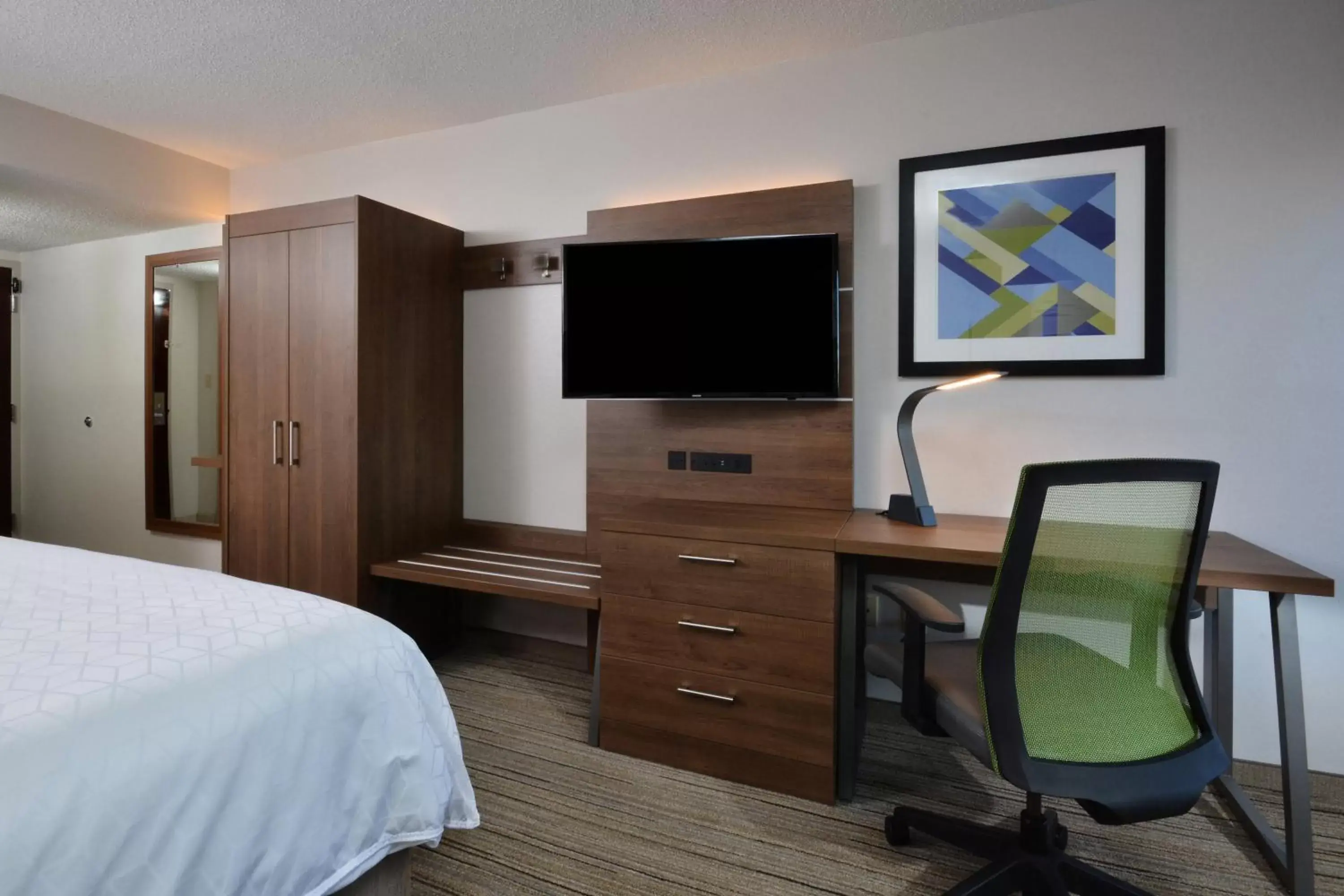 Photo of the whole room, TV/Entertainment Center in Holiday Inn Express Durham, an IHG Hotel