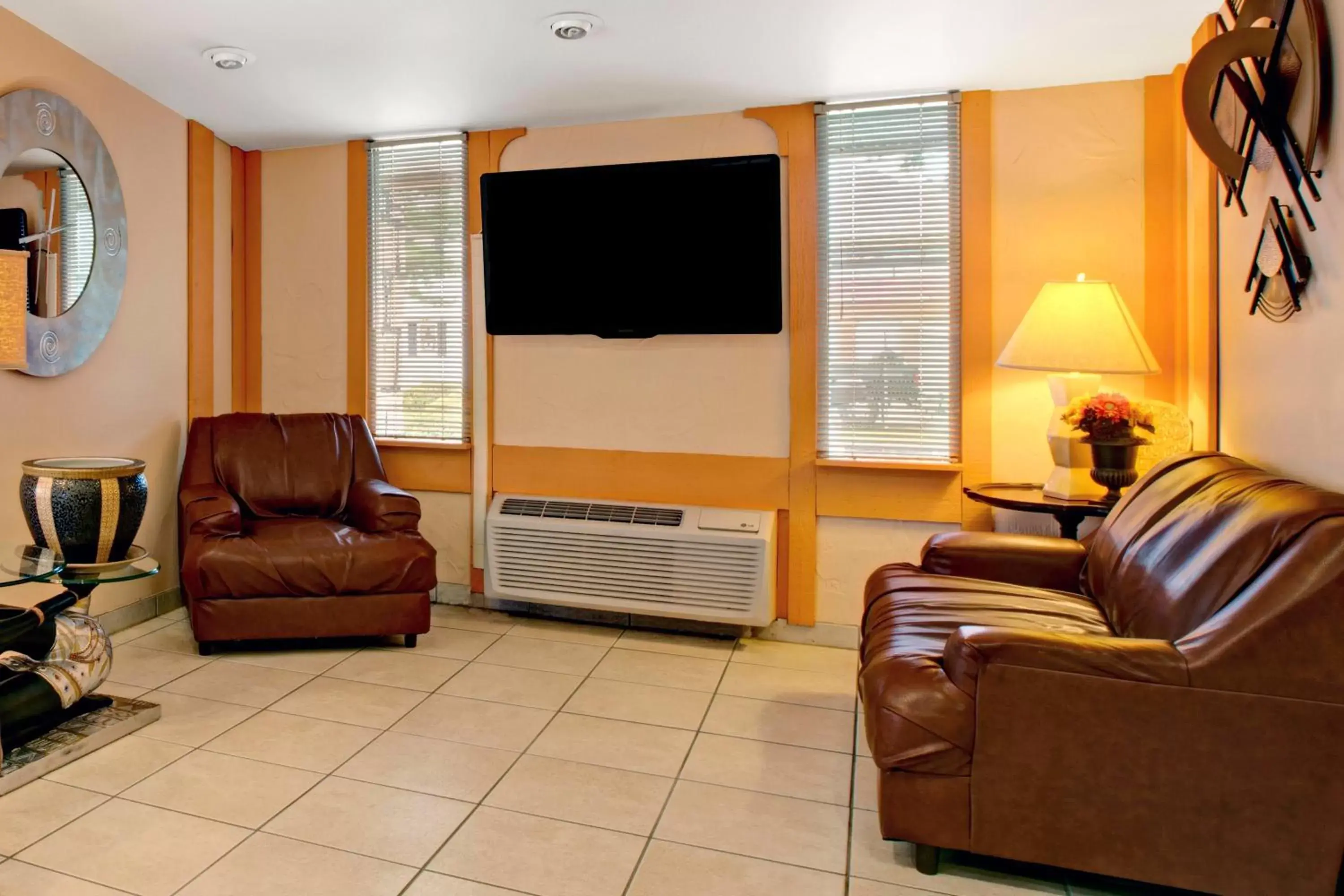 Communal lounge/ TV room, Seating Area in Knights Inn Greensburg