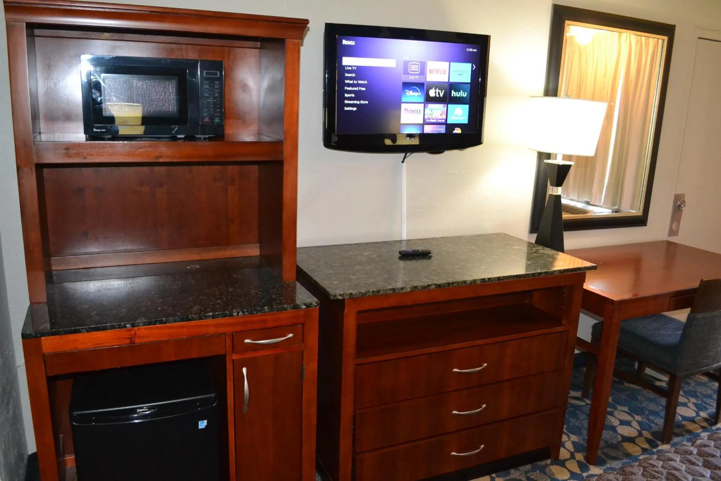 TV and multimedia, TV/Entertainment Center in Econo Lodge and Suites