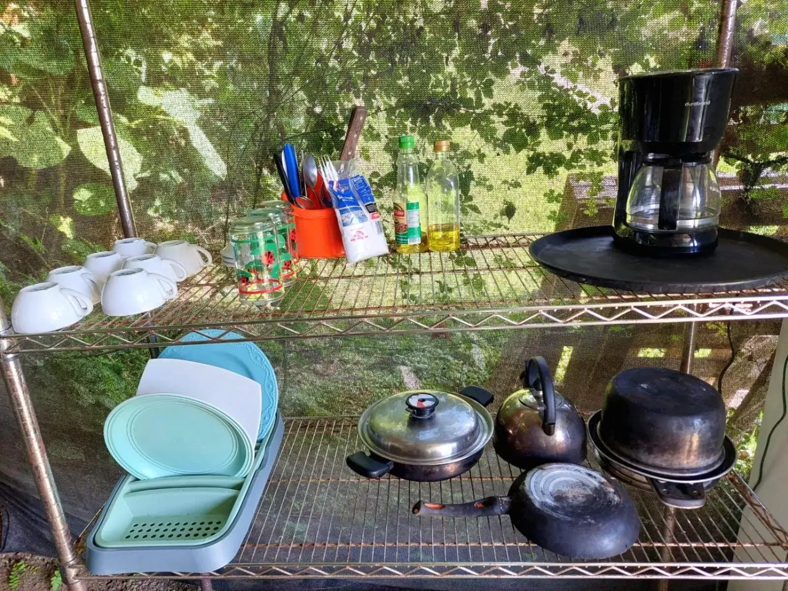 Communal kitchen in Rustico Arenal B&B