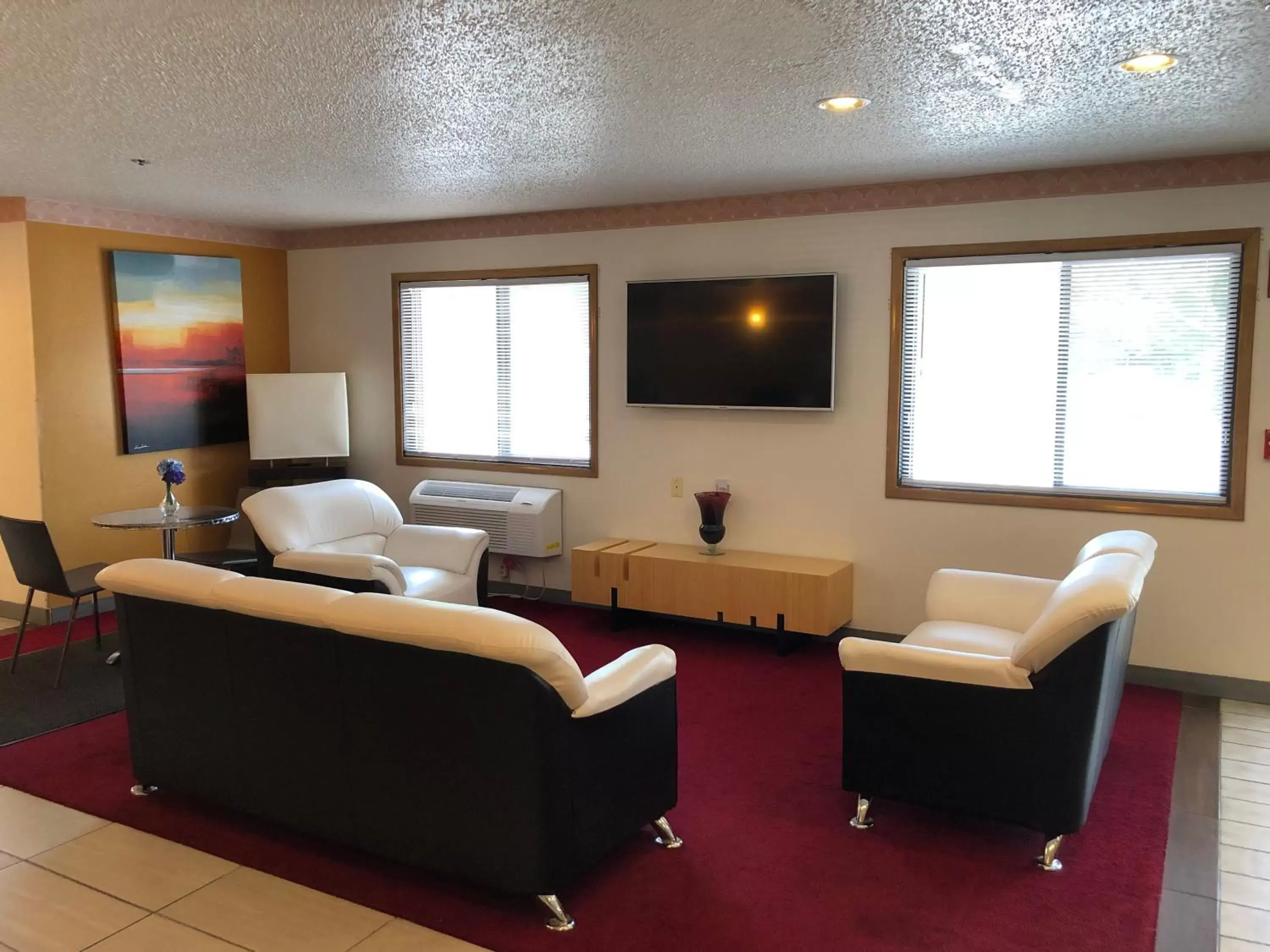 Lobby or reception in Super 8 by Wyndham Front Royal Lobby or reception in Super 8 by Wyndham Front Royal