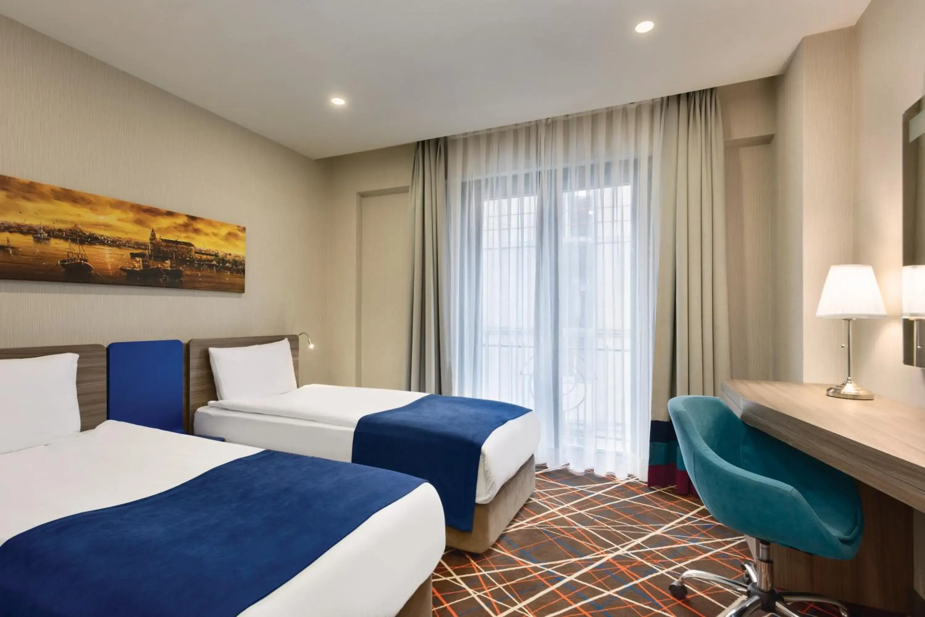 Photo of the whole room in Tryp by Wyndham Istanbul Taksim