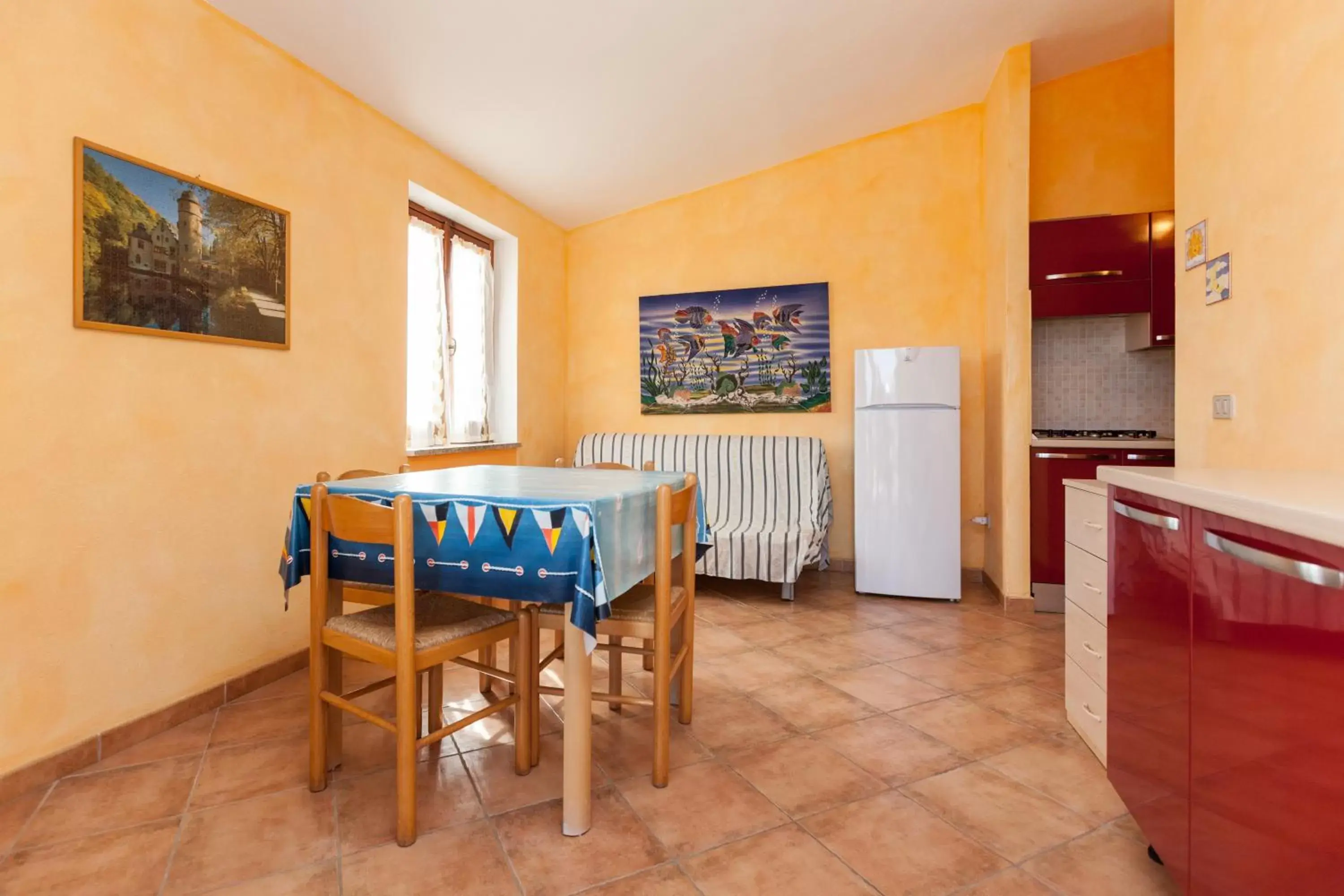 Kitchen or kitchenette, Dining Area in Porto Ottiolu Resort