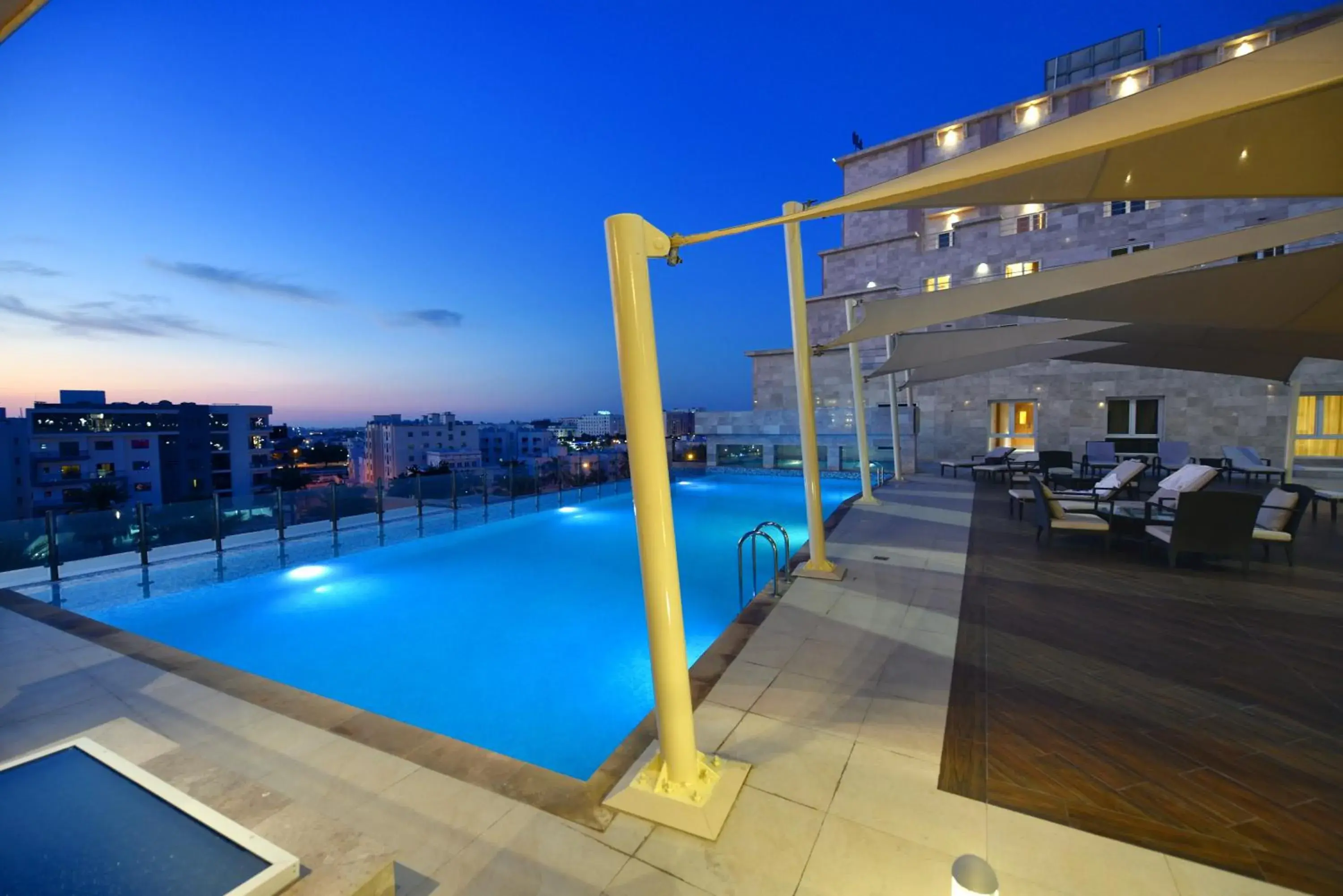 Property building, Swimming Pool in Levatio Suites Muscat, a member of Radisson Individuals