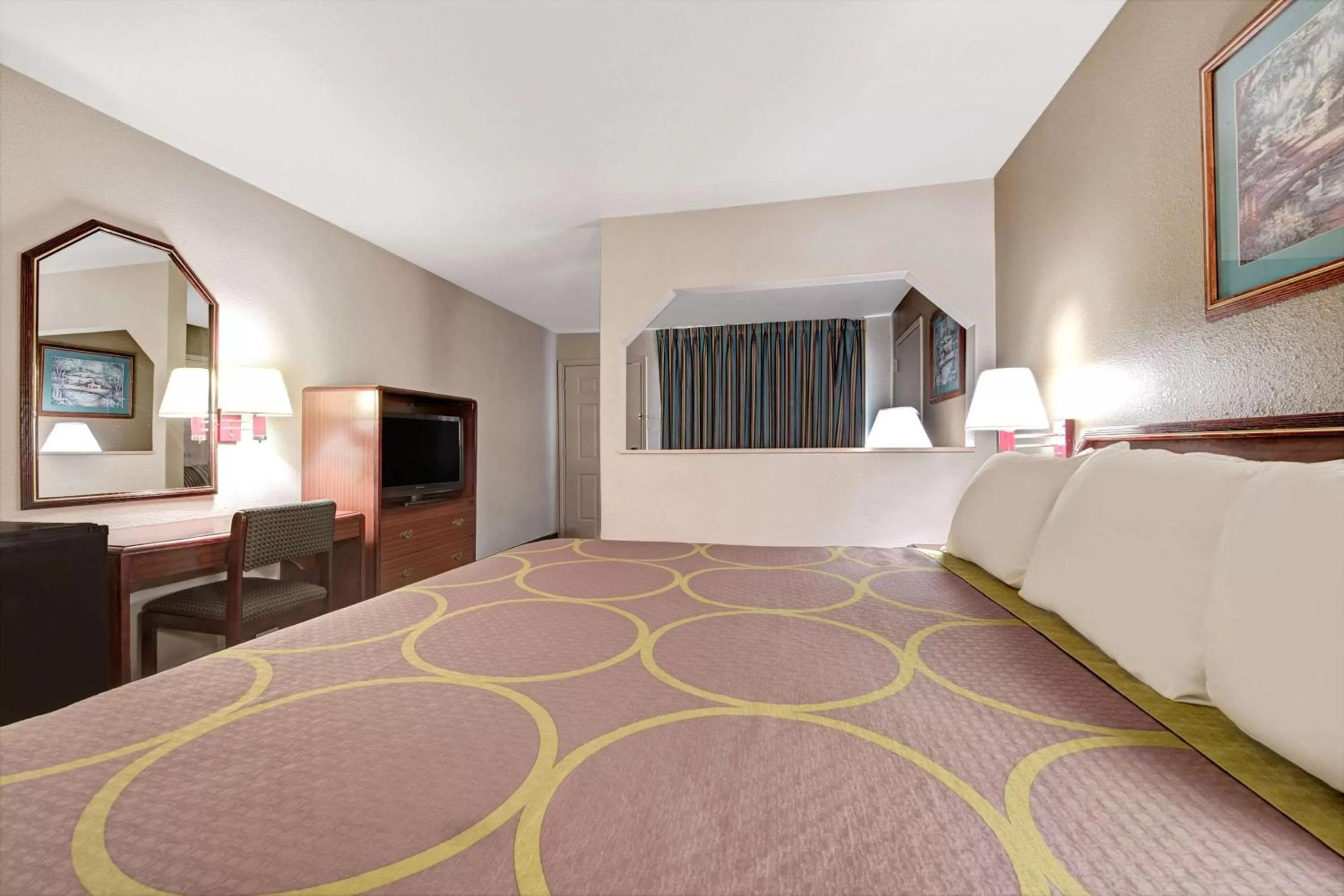 On site, Bed in Super 8 by Wyndham Richardson Dallas