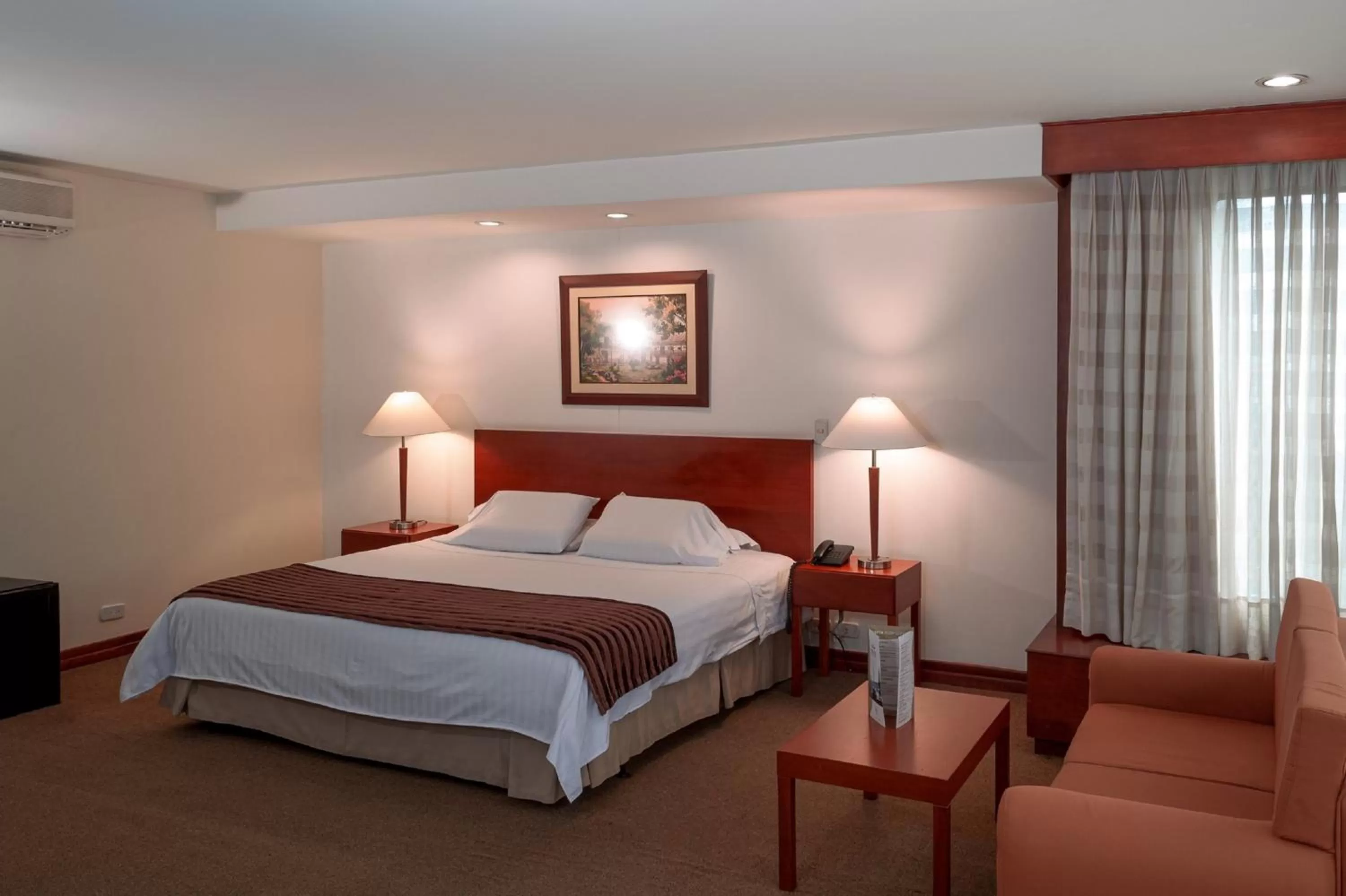 Bed in Torre de Cali Plaza Hotel