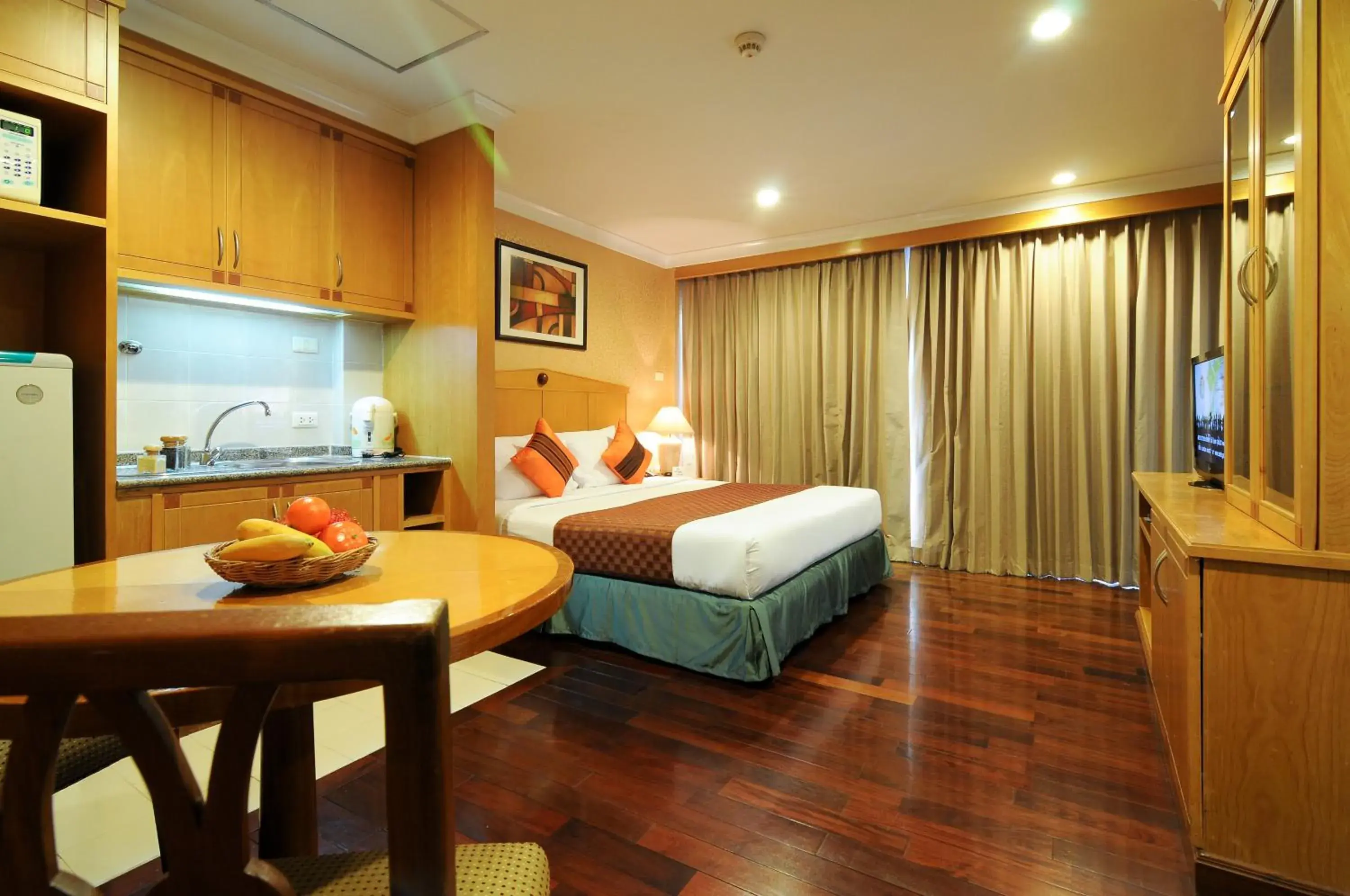 Bed in Admiral Suites Bangkok