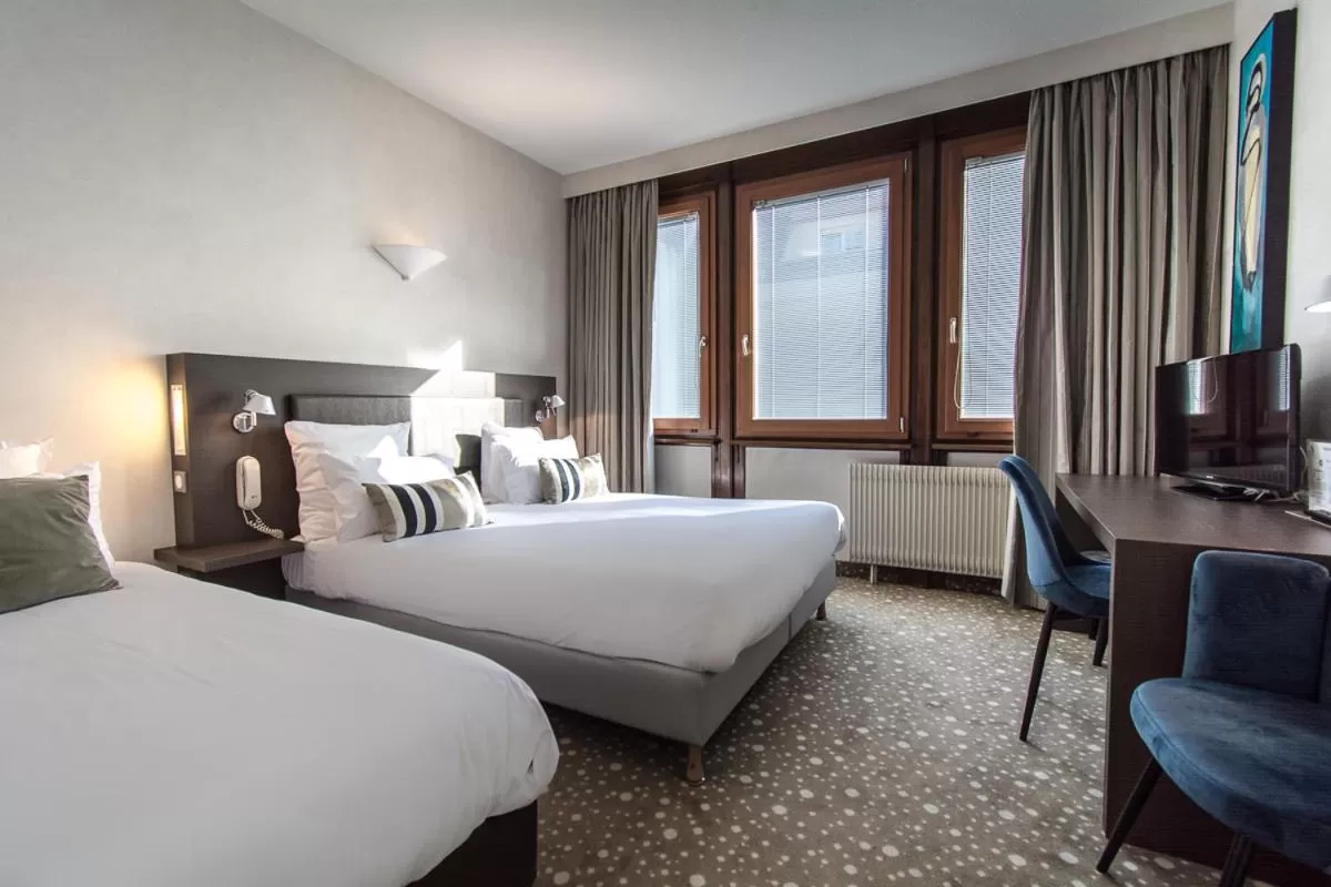 Photo of the whole room, Bed in Hôtel Restaurant Vaillant proche Europapark Rulantica