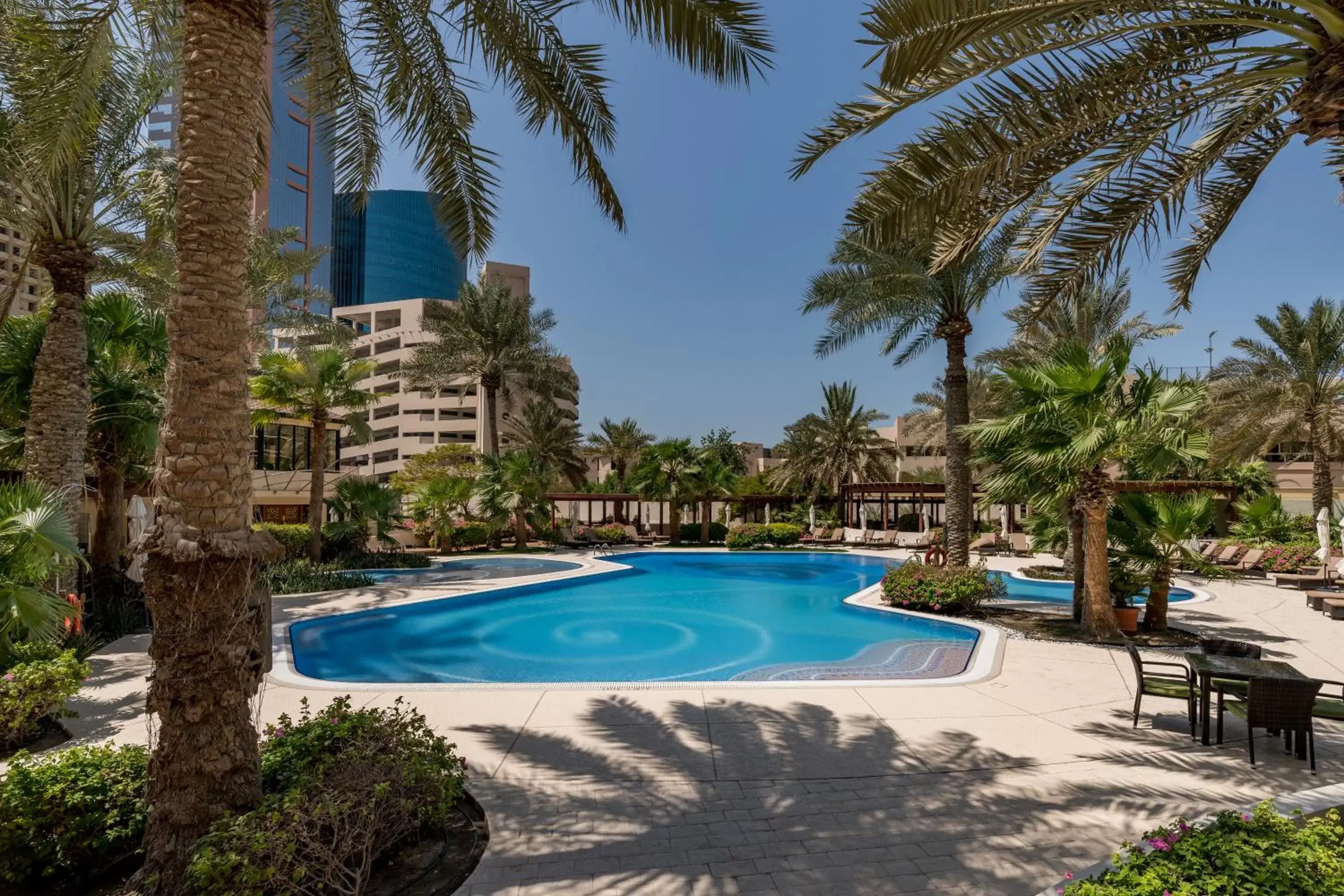 Property building, Swimming Pool in The Diplomat Radisson Blu Hotel Residence & Spa