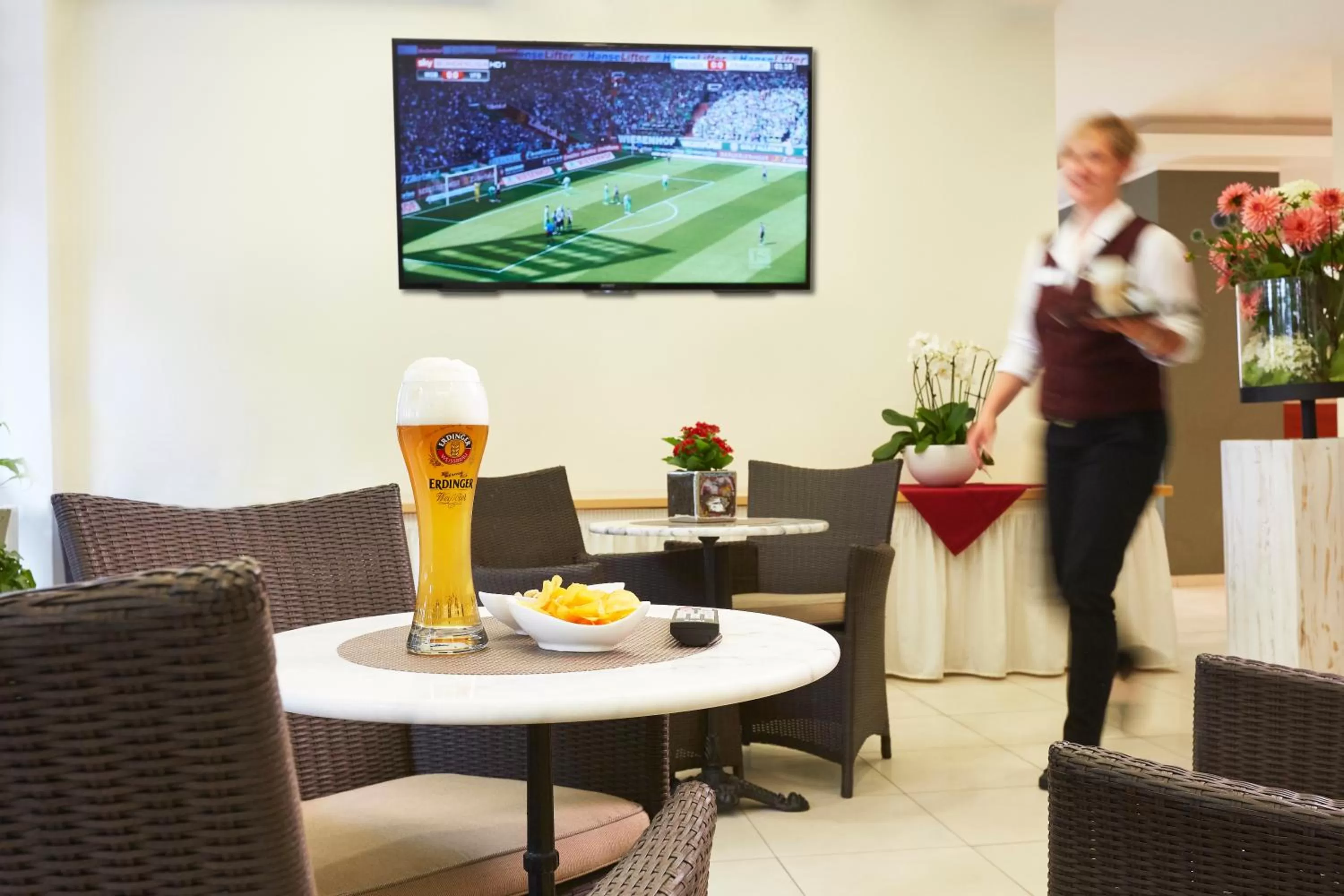 Communal lounge/ TV room in IN VIA Hotel