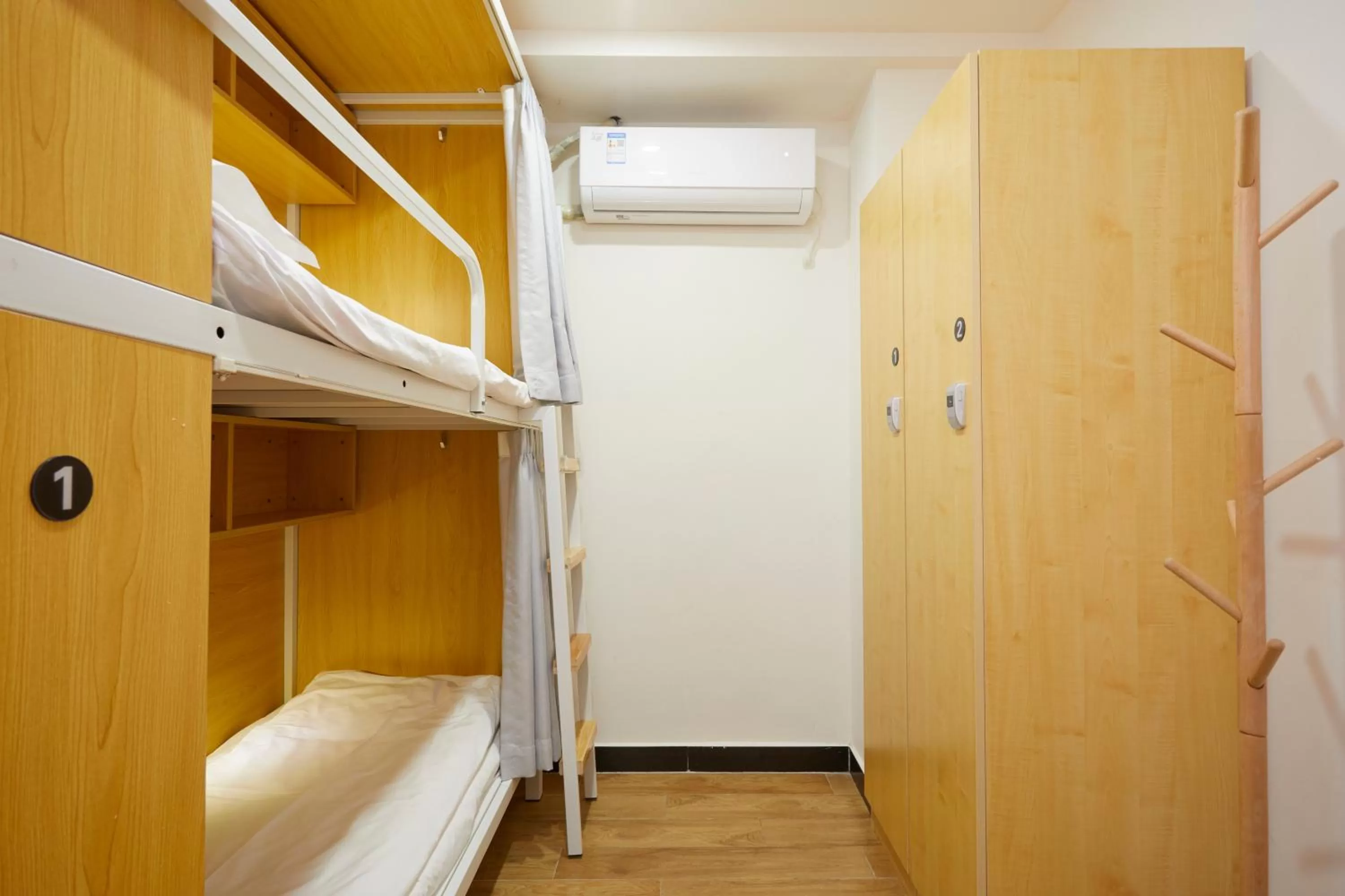 Bed in Meego Yes Hotel