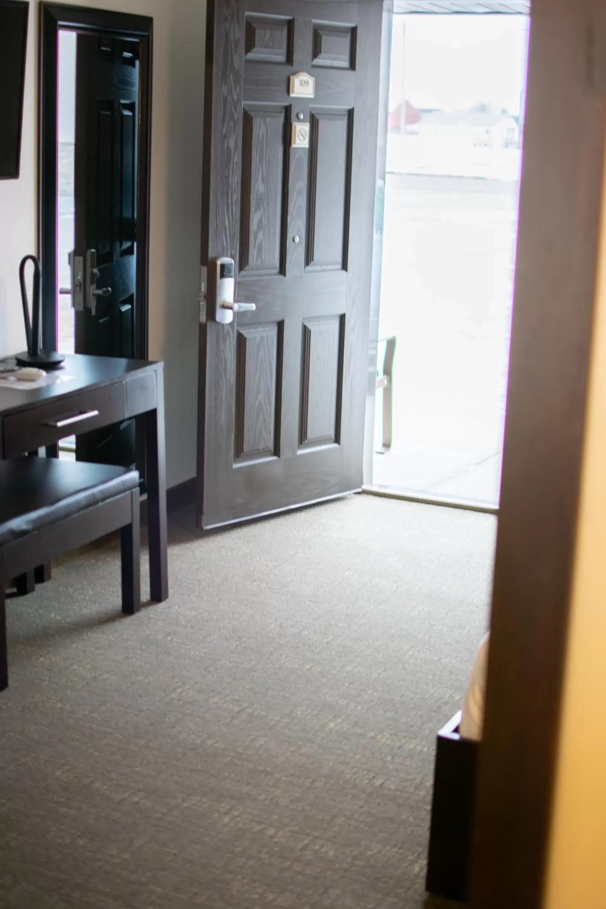 Bedroom in Boarders Inn & Suites by Cobblestone Hotels - Syracuse Bedroom in Boarders Inn & Suites by Cobblestone Hotels - Syracuse