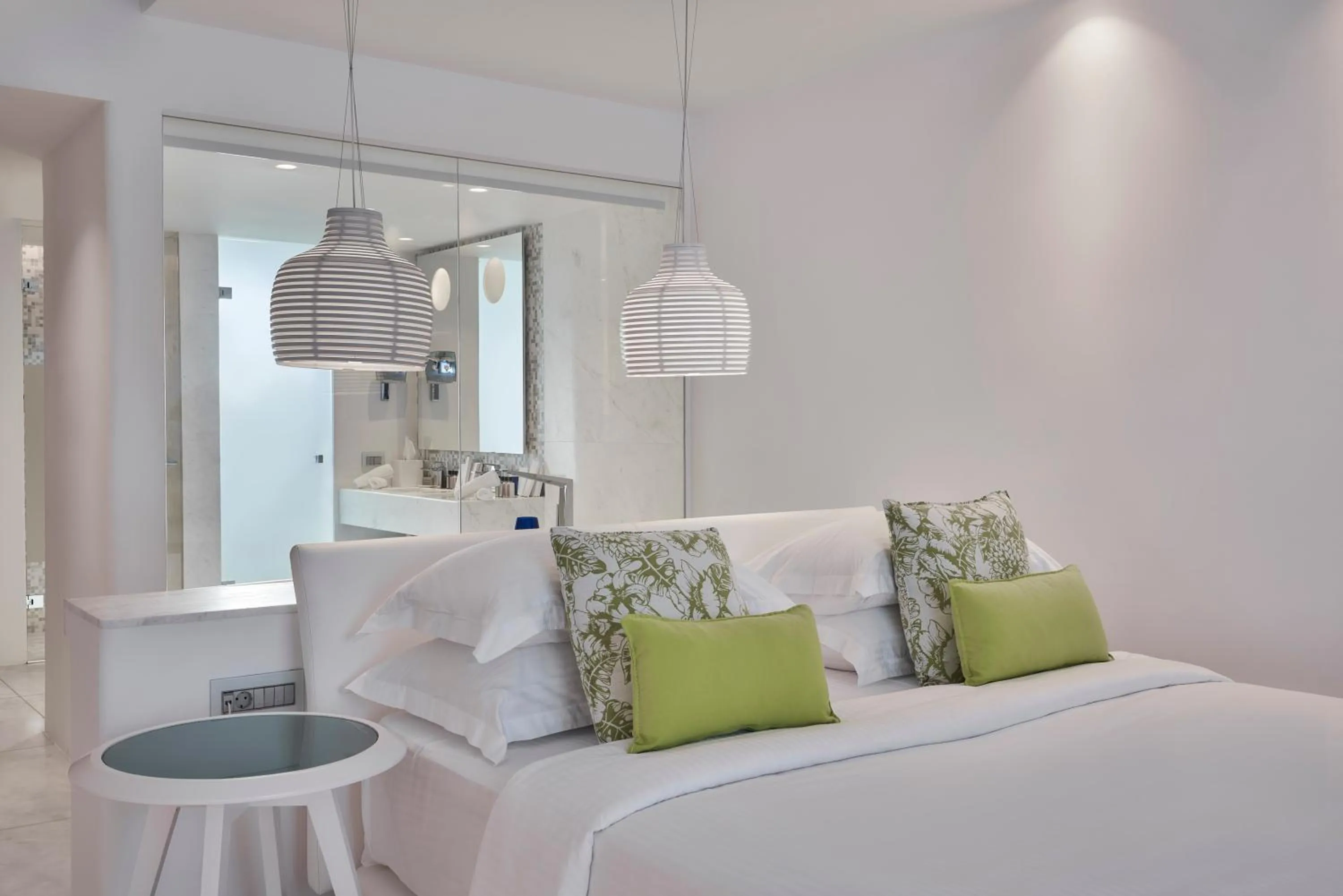 Bed in Myconian Ambassador Relais & Chateaux