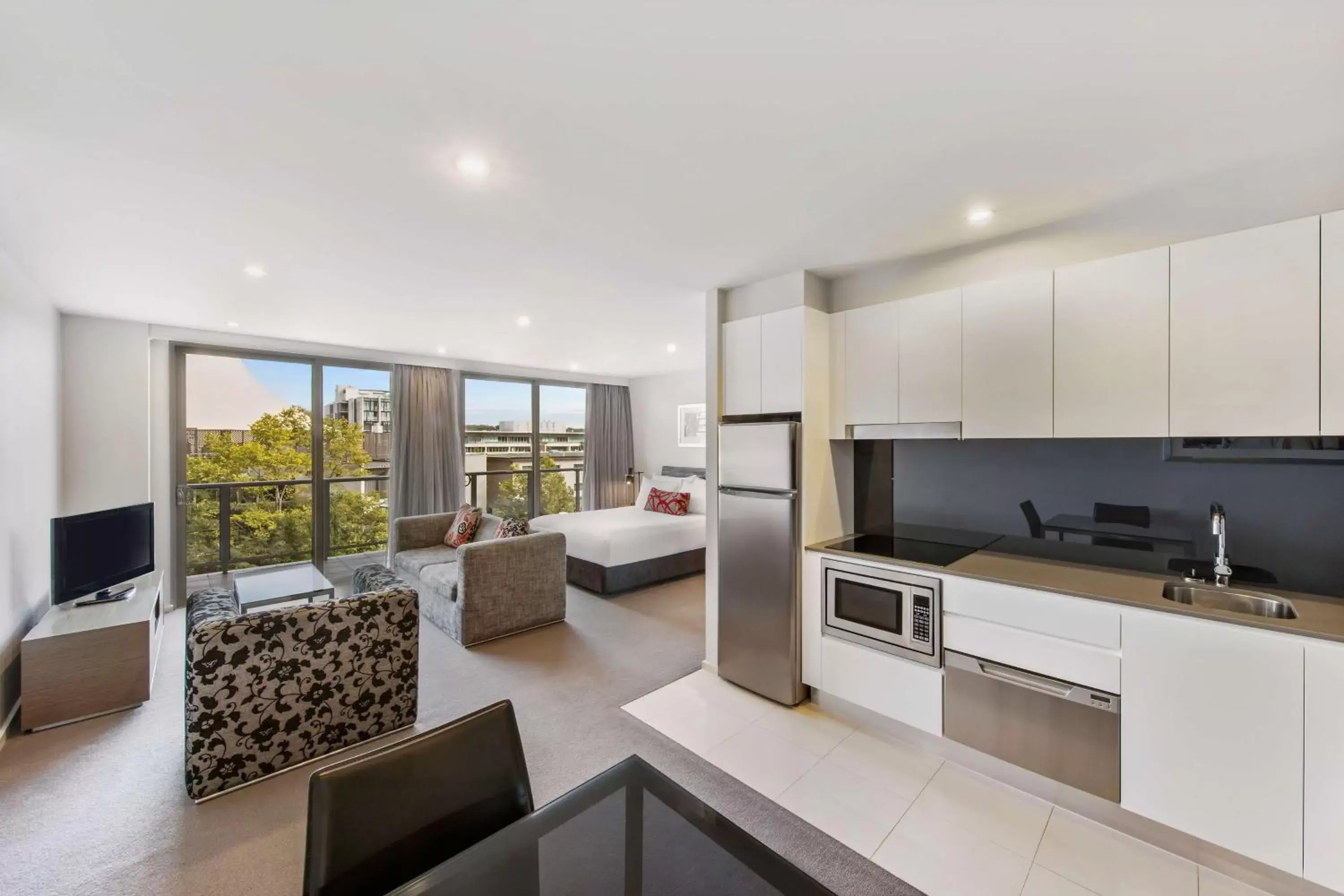Bedroom, Kitchen/Kitchenette in Adina Serviced Apartments Canberra Dickson