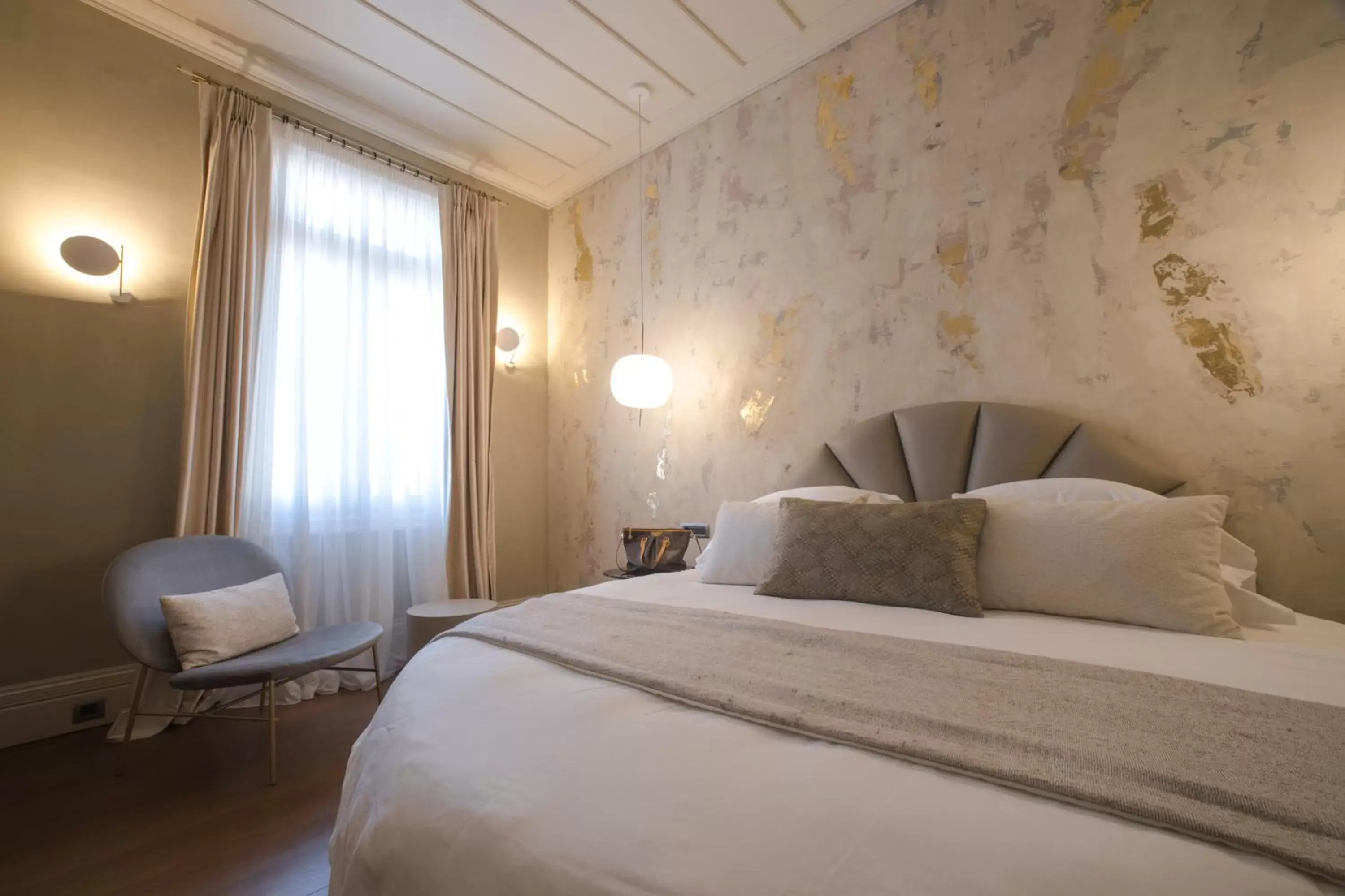 Bed in Castellano Hotel & Suites