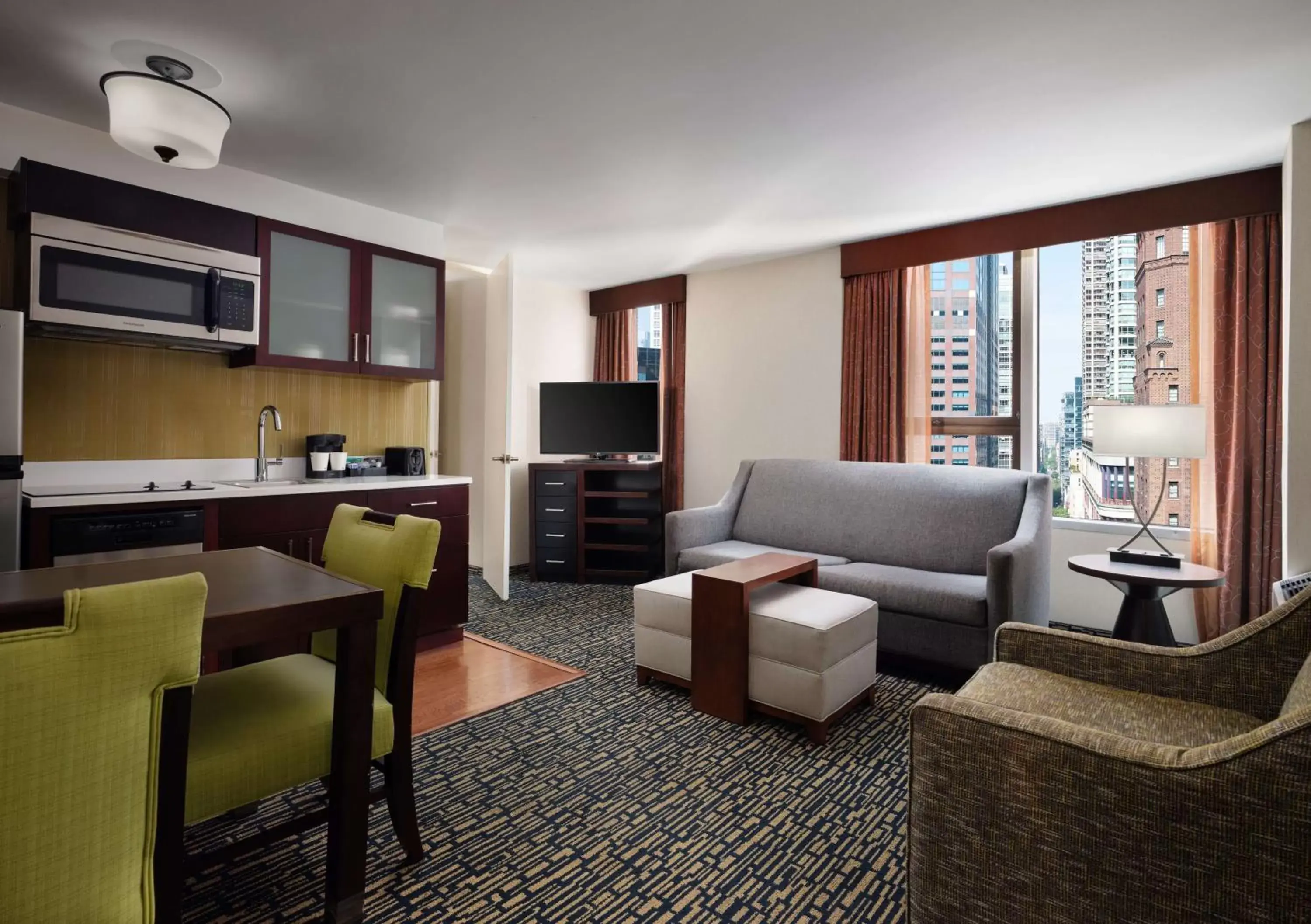 Living room, Seating Area in Homewood Suites by Hilton Chicago Downtown - Magnificent Mile