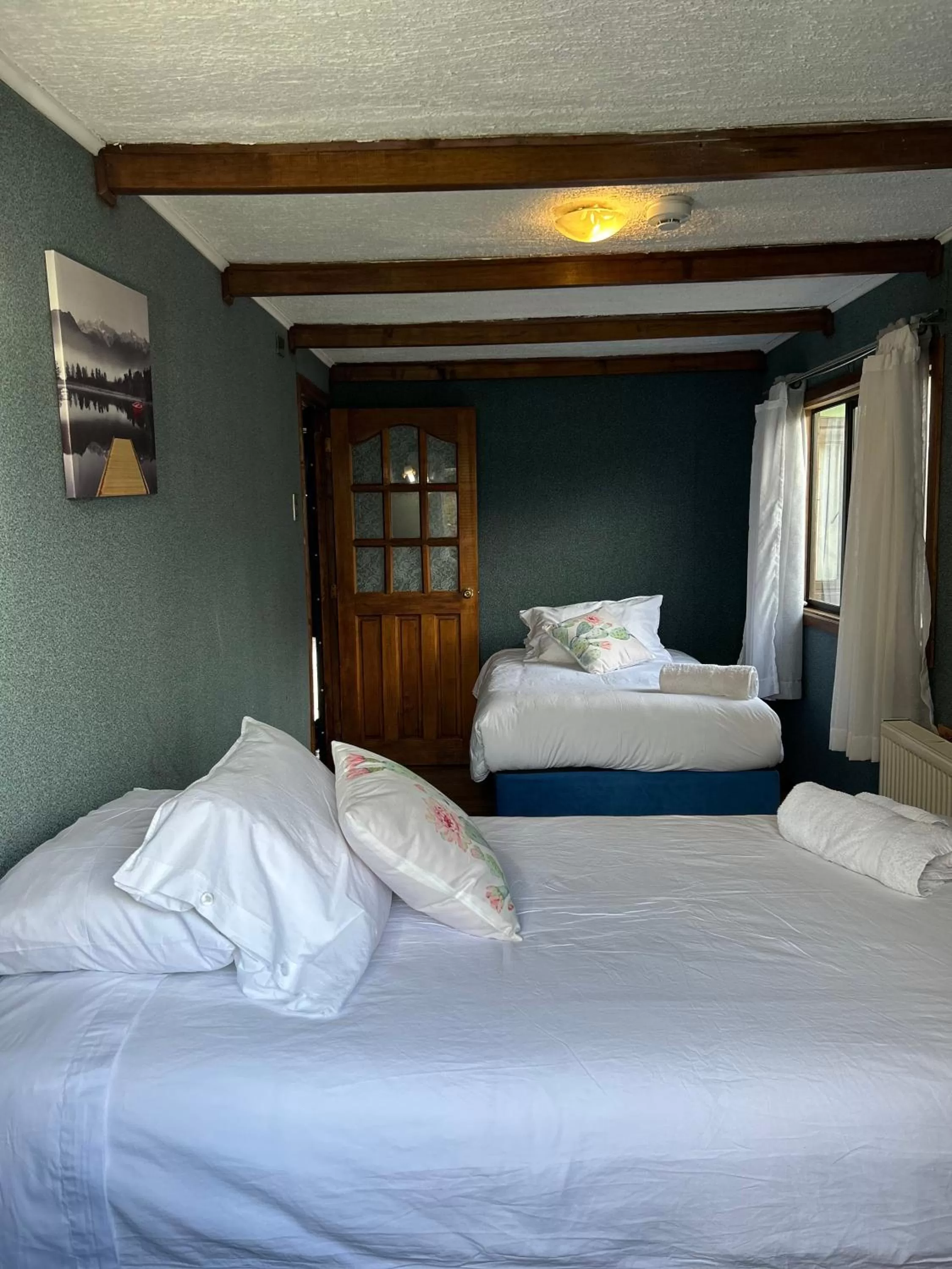 Bed in Hospedaje Isla Magdalena