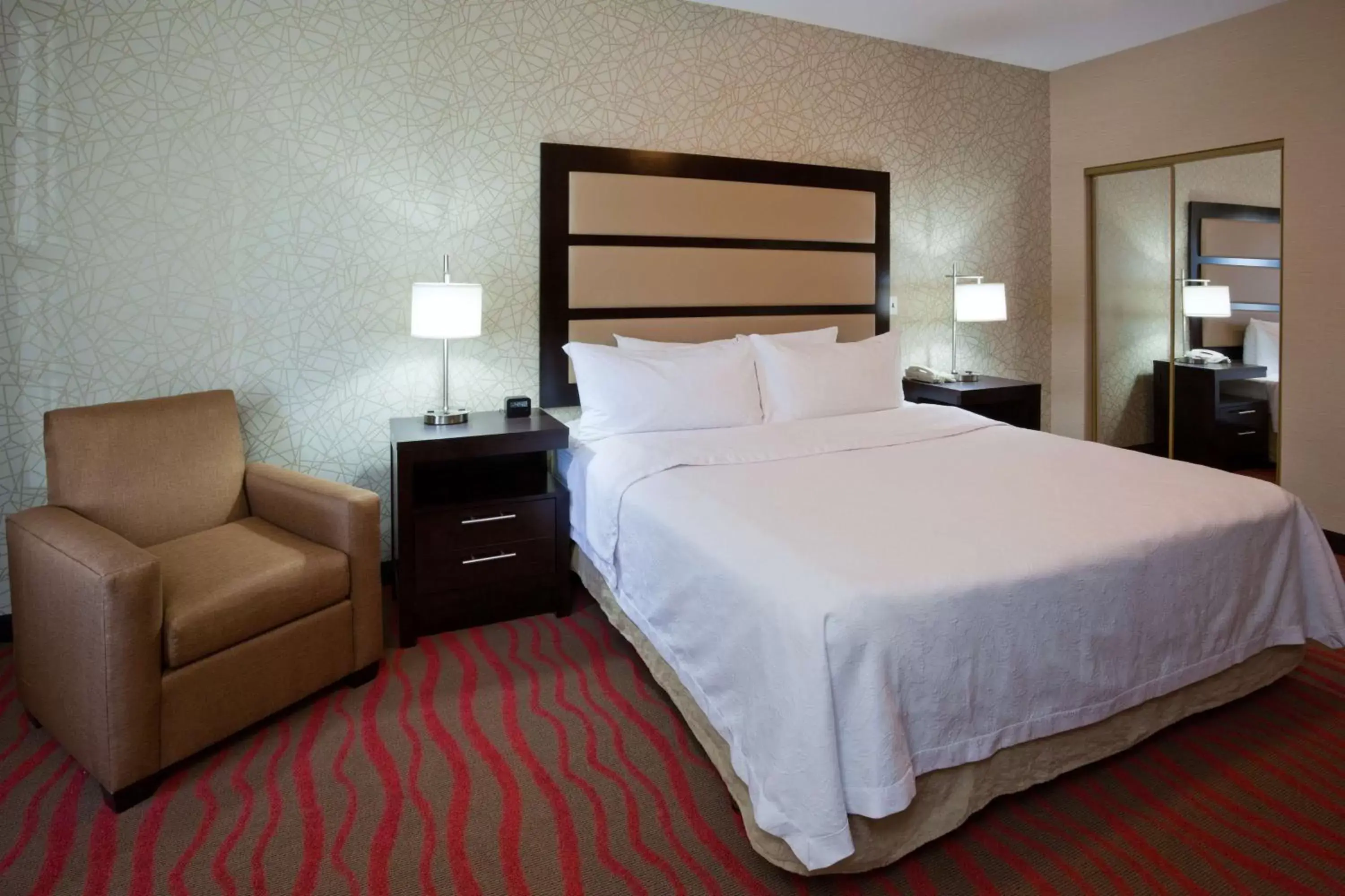 Bed in Homewood Suites by Hilton Sioux Falls