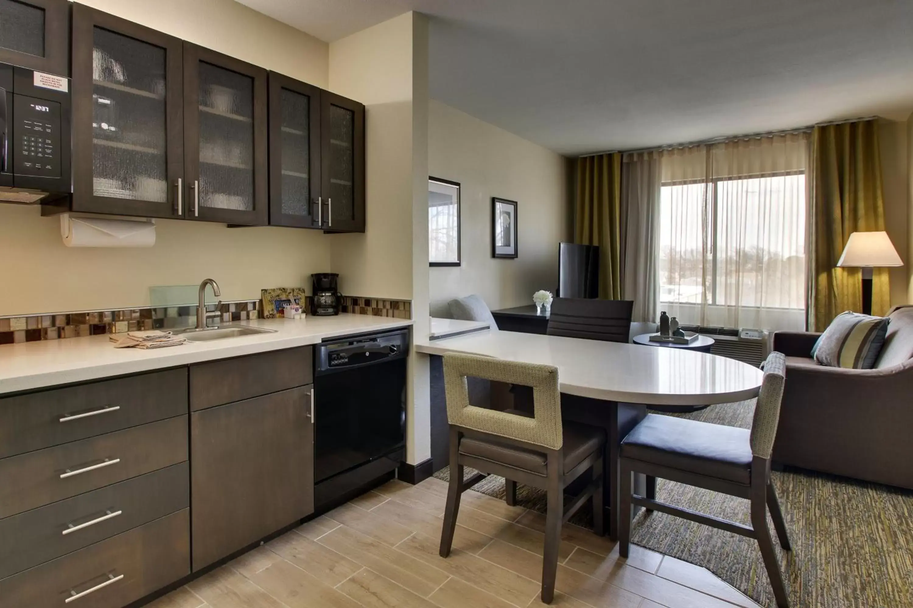 Photo of the whole room, Kitchen/Kitchenette in Candlewood Suites - Wichita East, an IHG Hotel