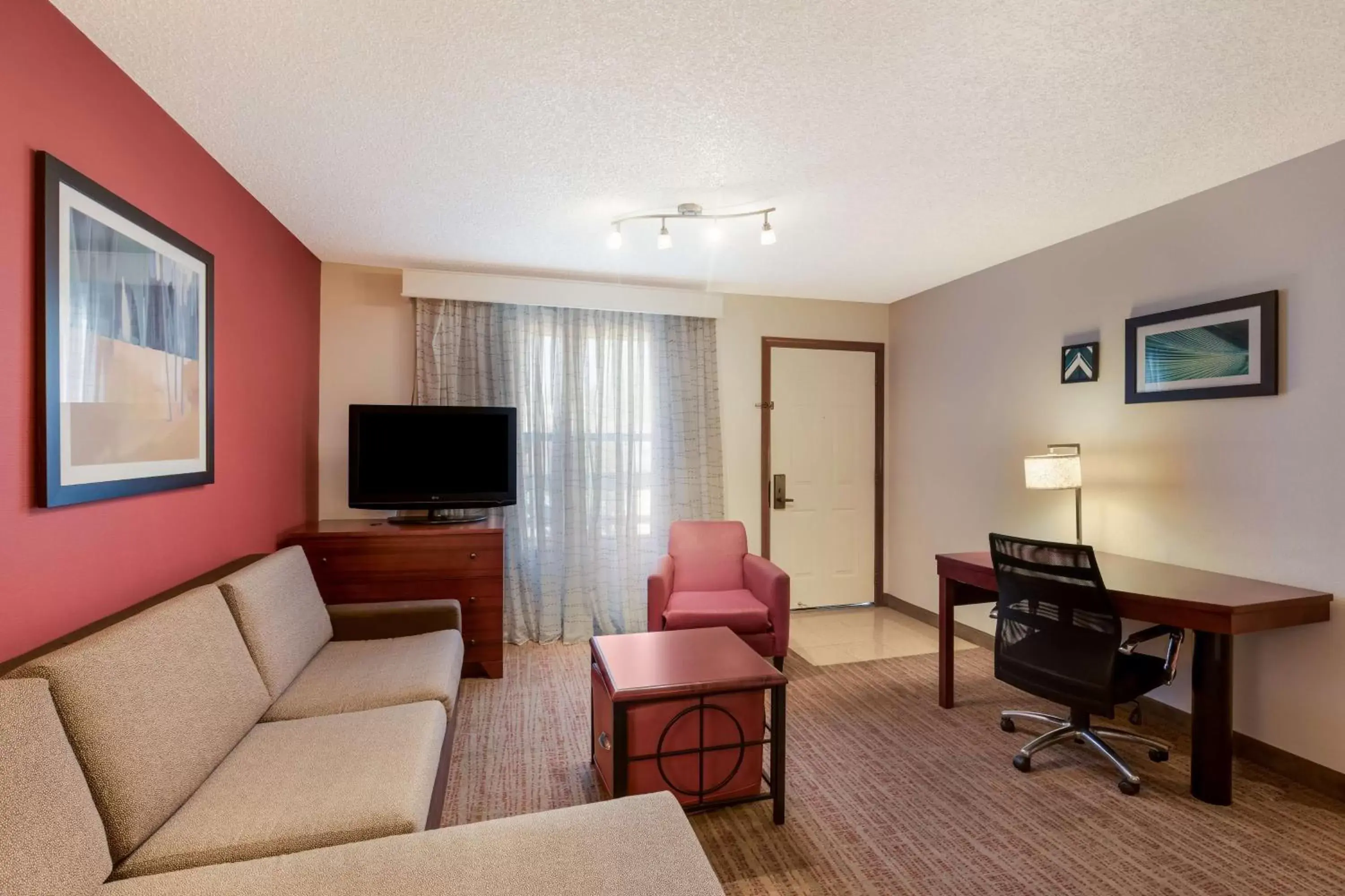 Bedroom, Seating Area in SenS Suites Livermore; SureStay Collection by Best Western