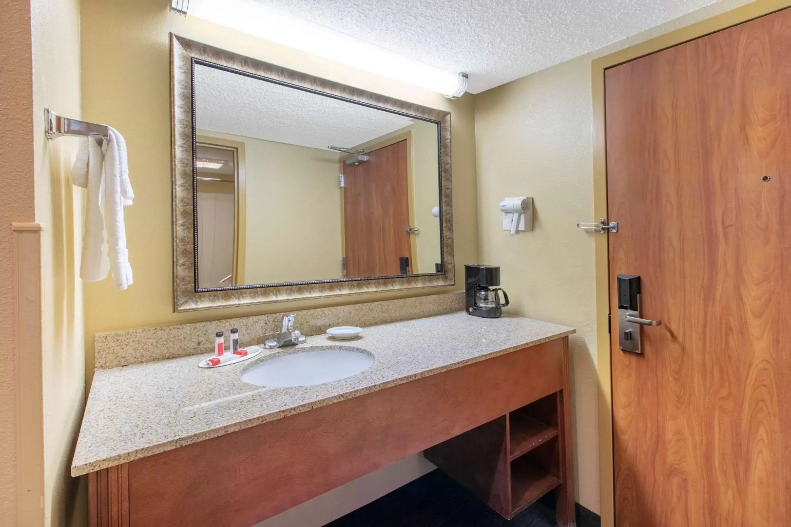 Bathroom in Days Inn by Wyndham Tulsa Central