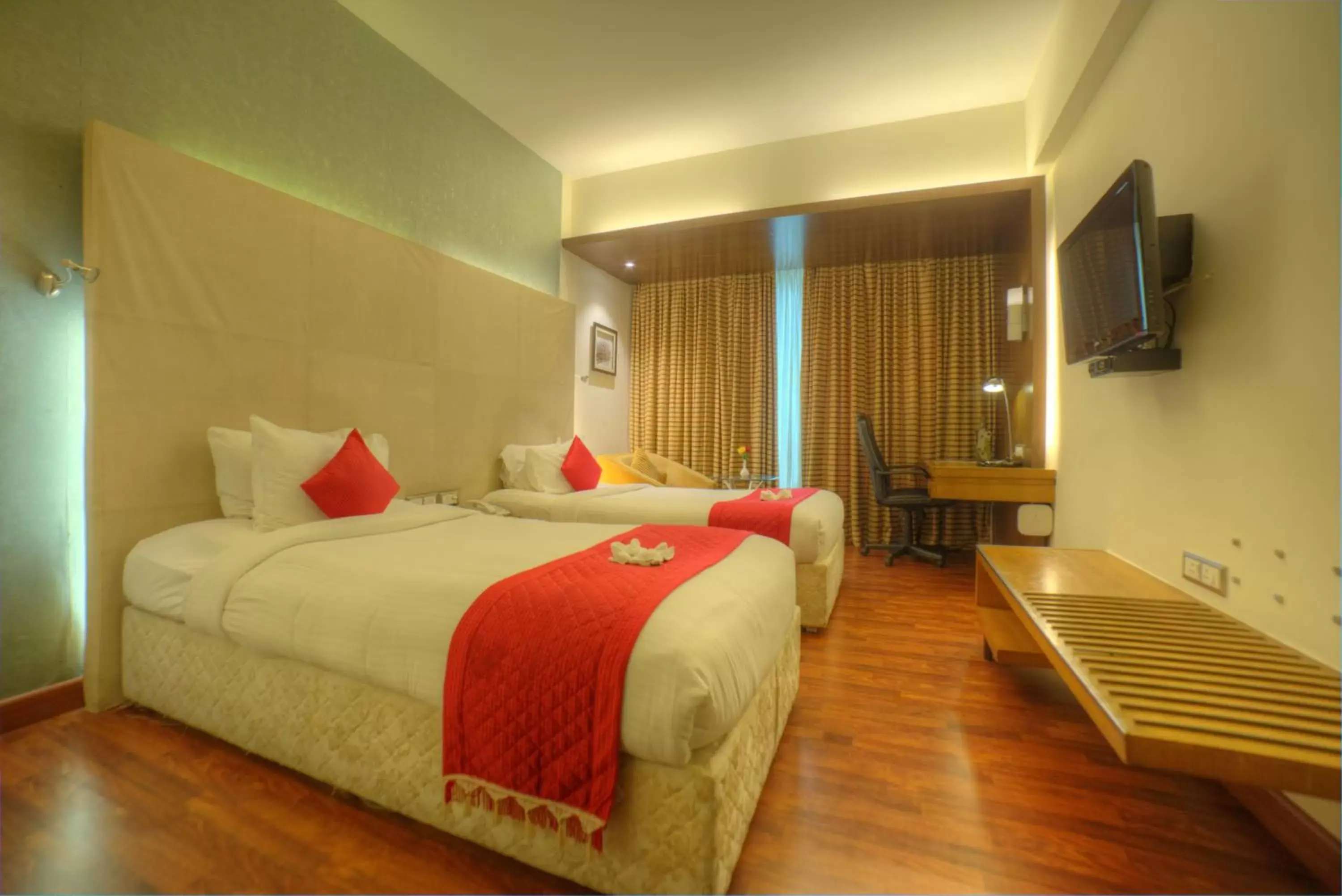 Bed in Goldfinch Hotel Mangalore