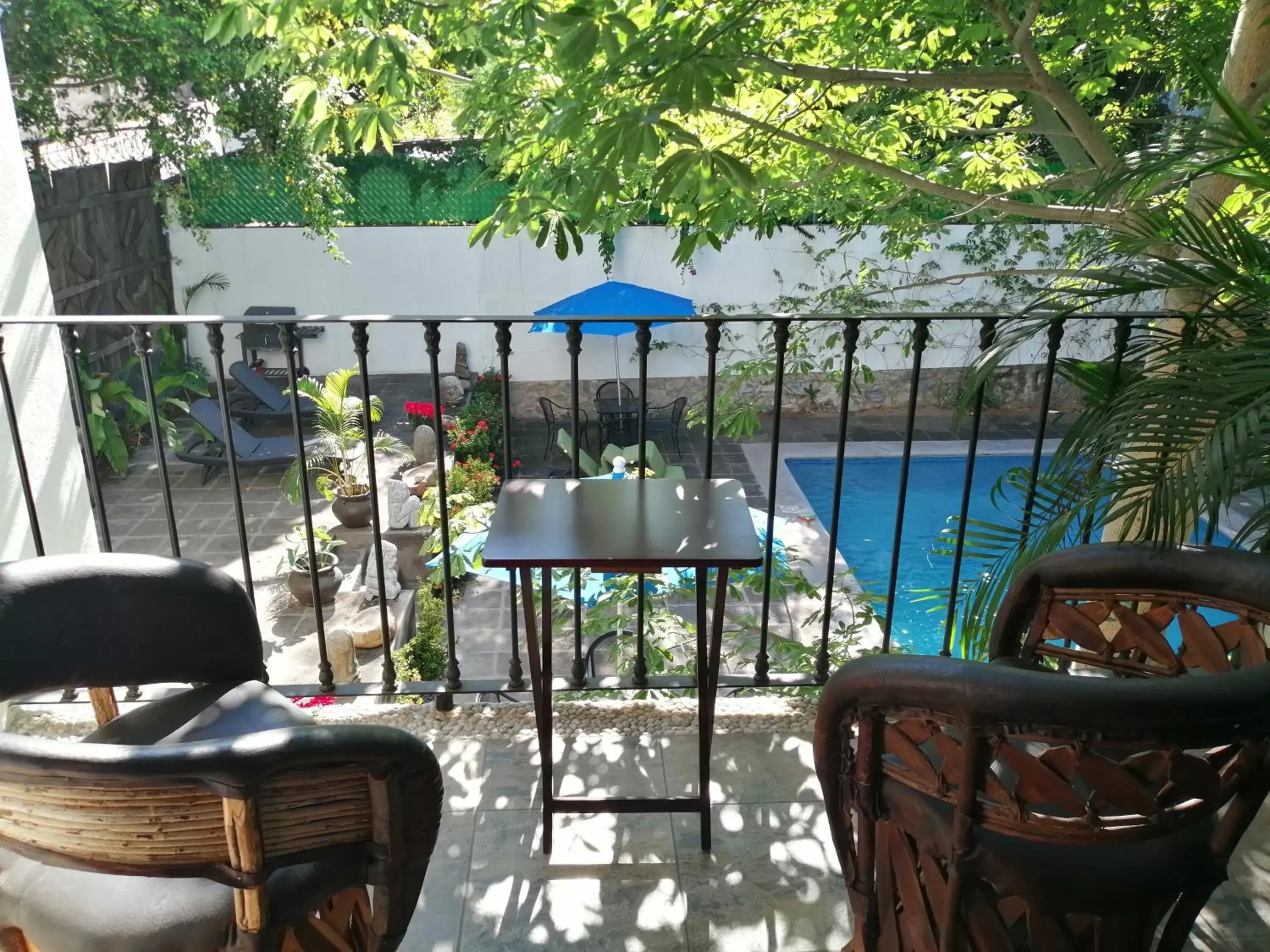 Balcony/Terrace, Pool View in Ceiba Studios