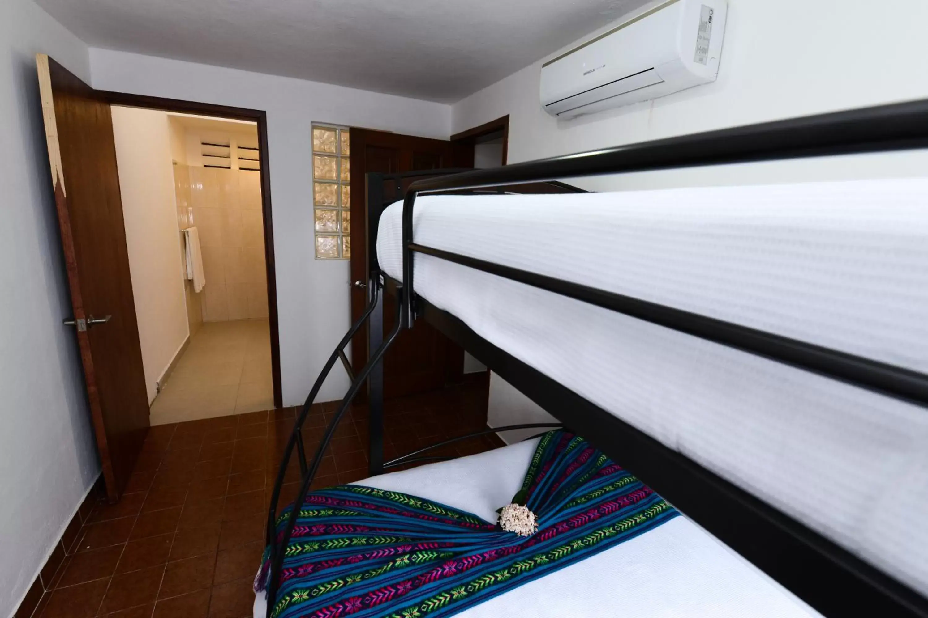 Bedroom, Bunk Bed in Hotel Villas Colibrí Suites & Bungalows