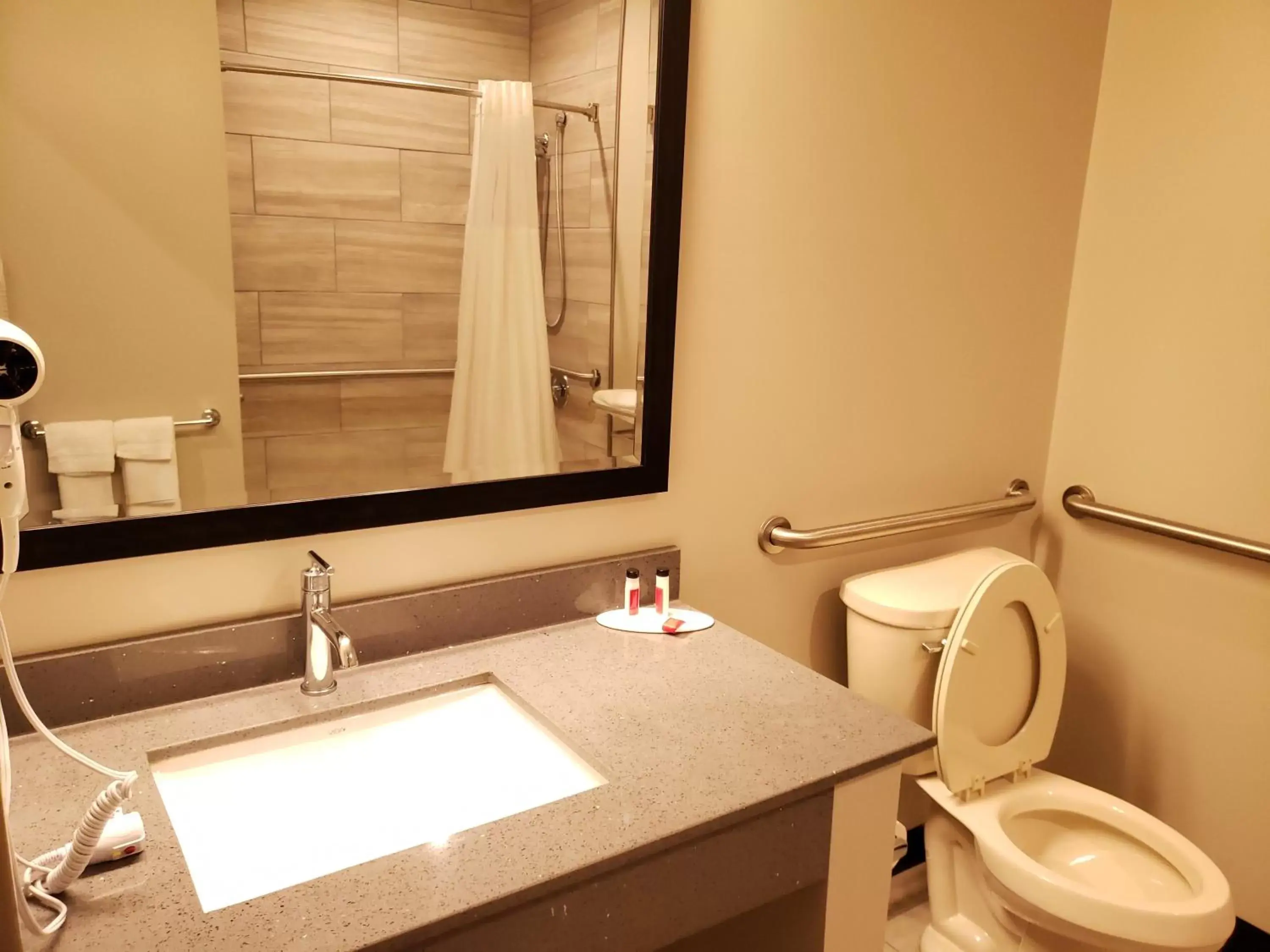 Bathroom in Super 8 by Wyndham St. Louis North