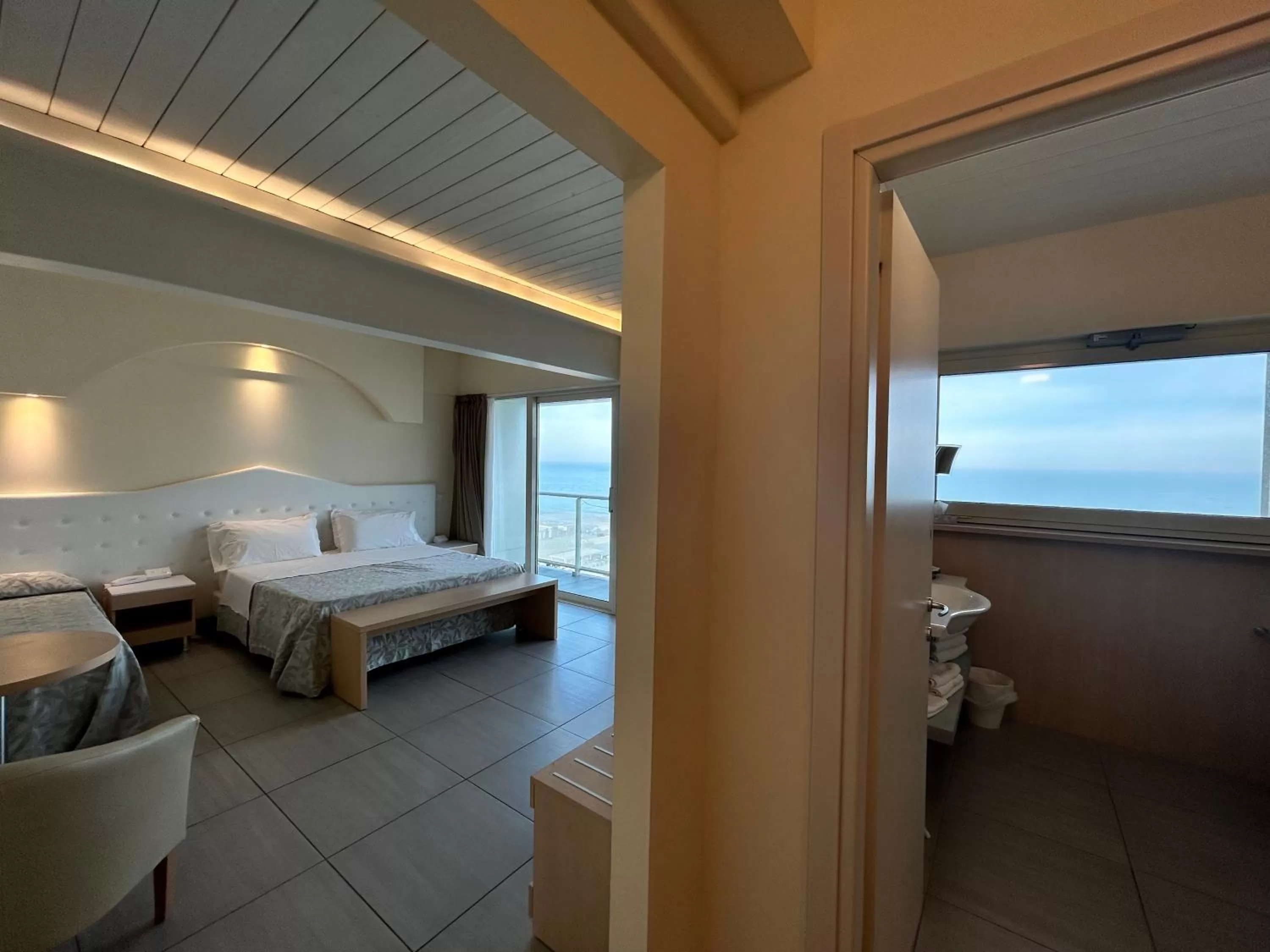 Property building, Bed in Hotel Adria