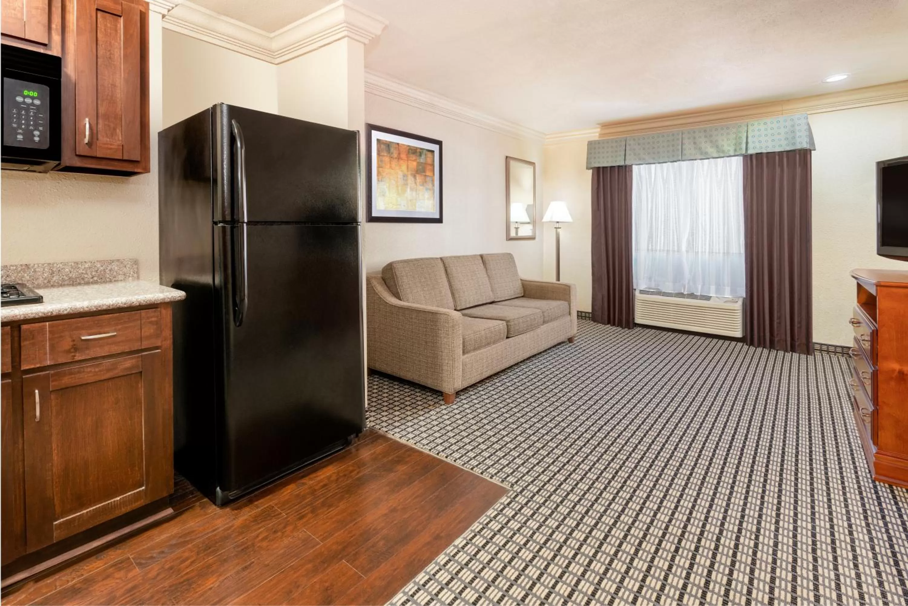Living room in Ramada by Wyndham Houston Intercontinental Airport South