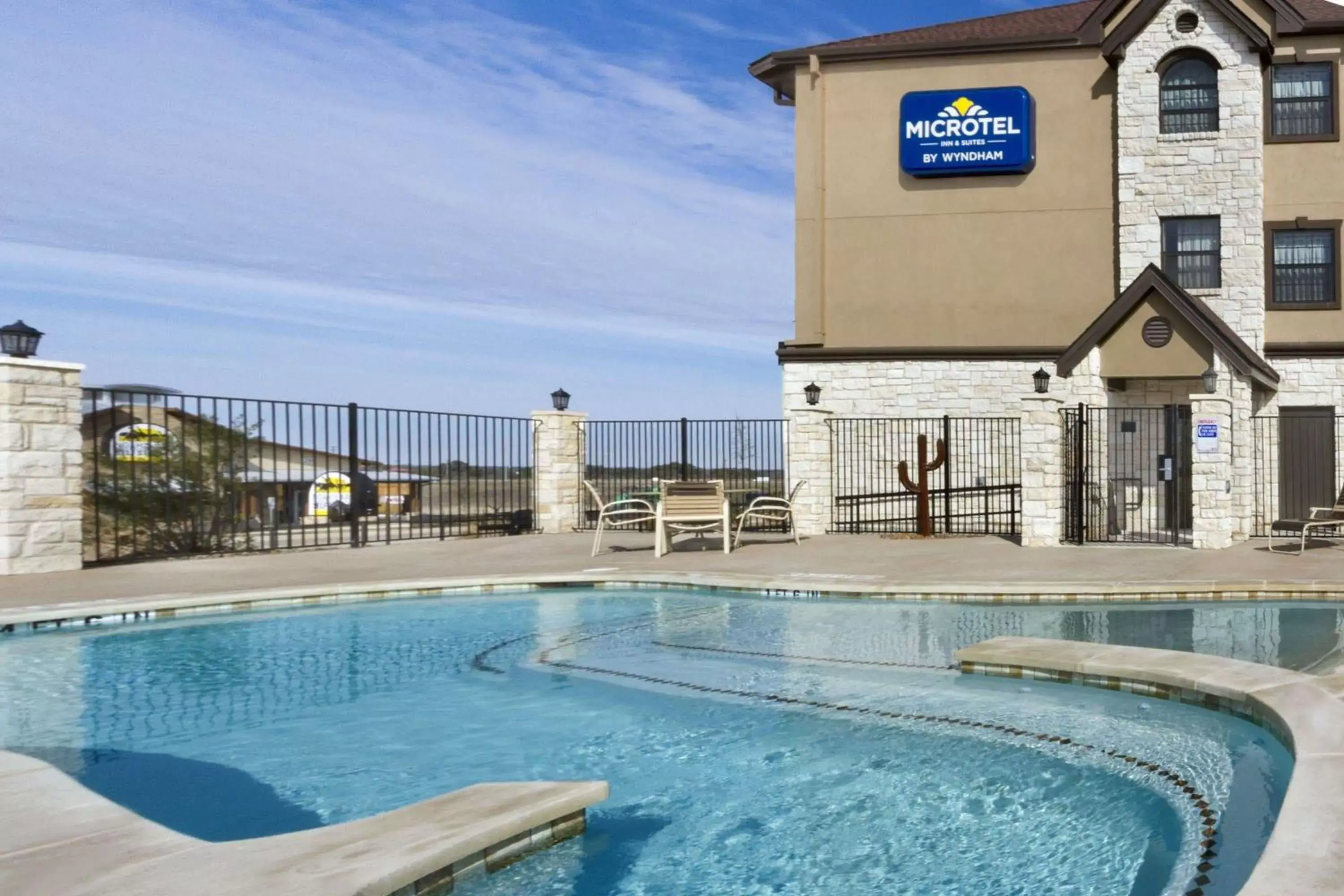 On site, Swimming Pool in Microtel Inn & Suites by Wyndham Buda Austin South