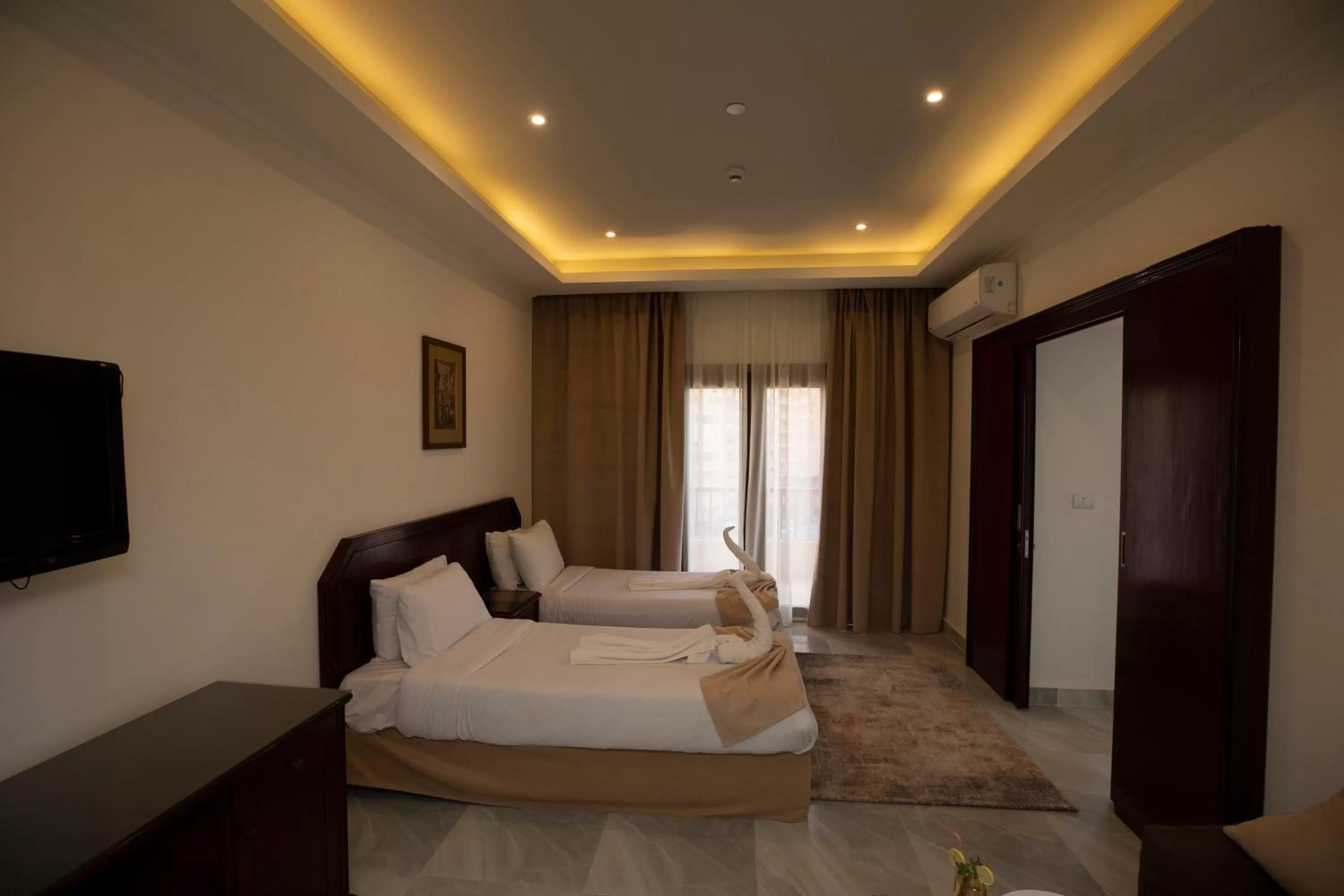 Living room, Bed in AIFU Hotel El Montazah Alexandria