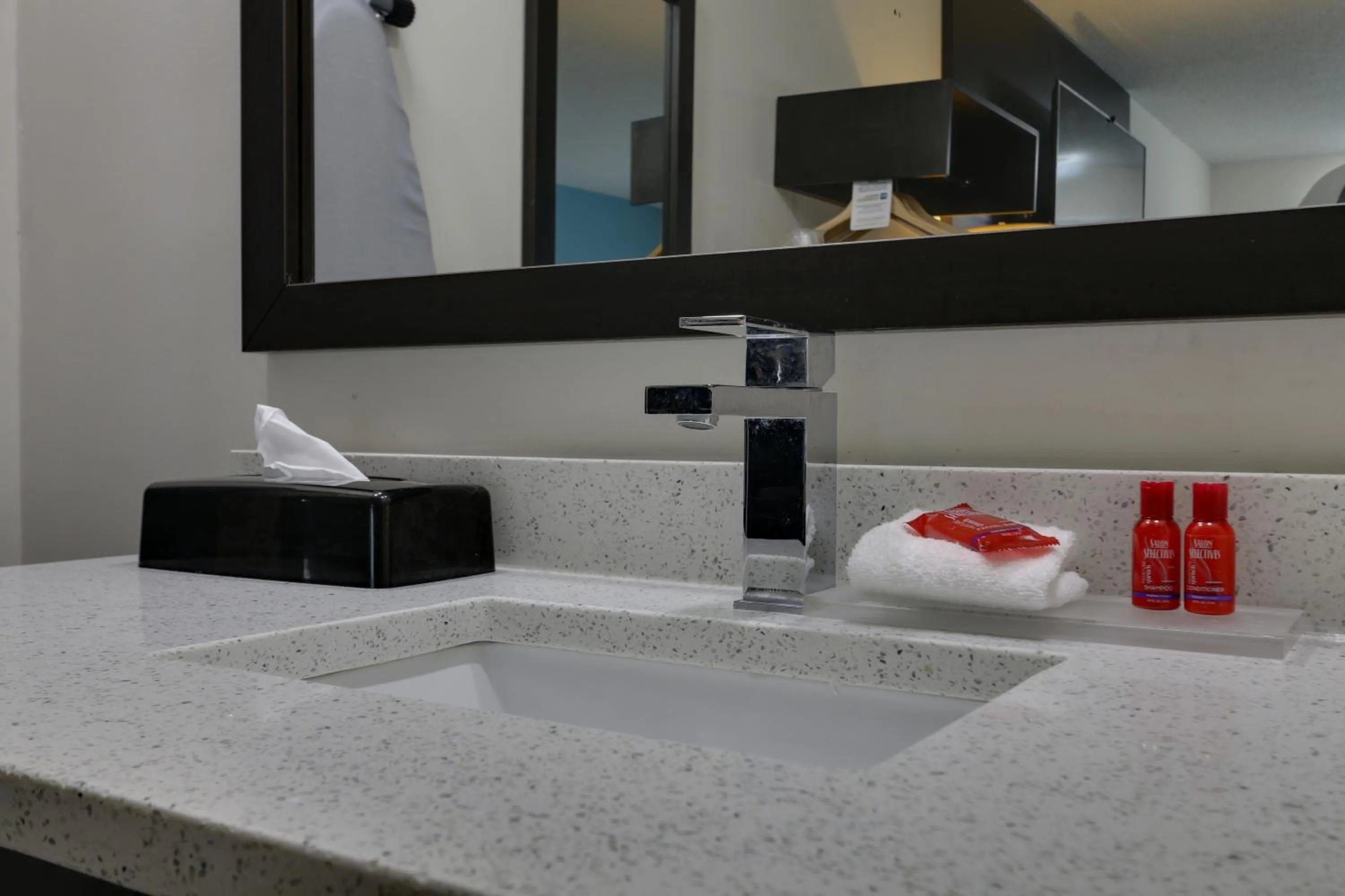 Bathroom in Travelodge by Wyndham Calhoun South I-75