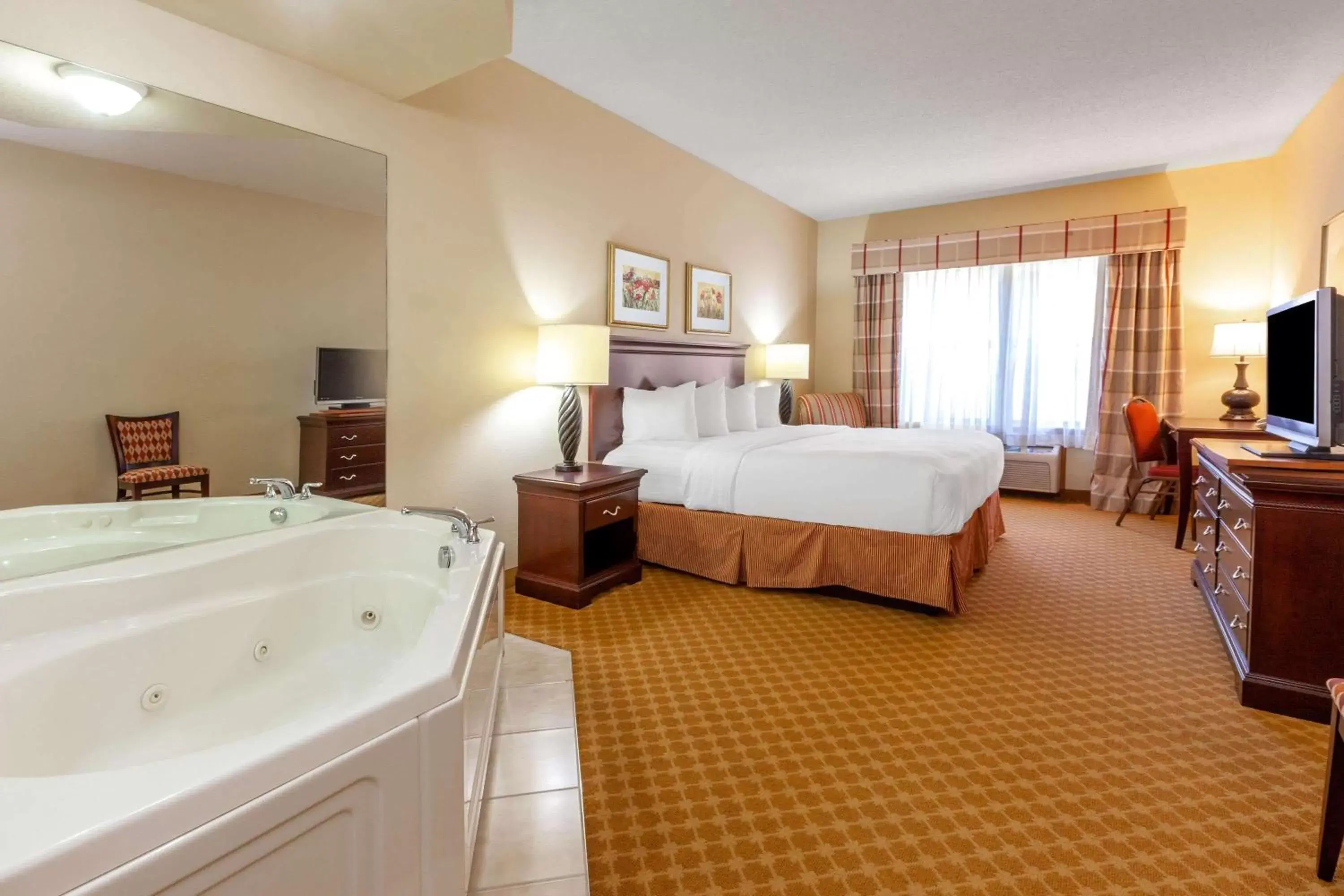Photo of the whole room in AmericInn by Wyndham Iron Mountain