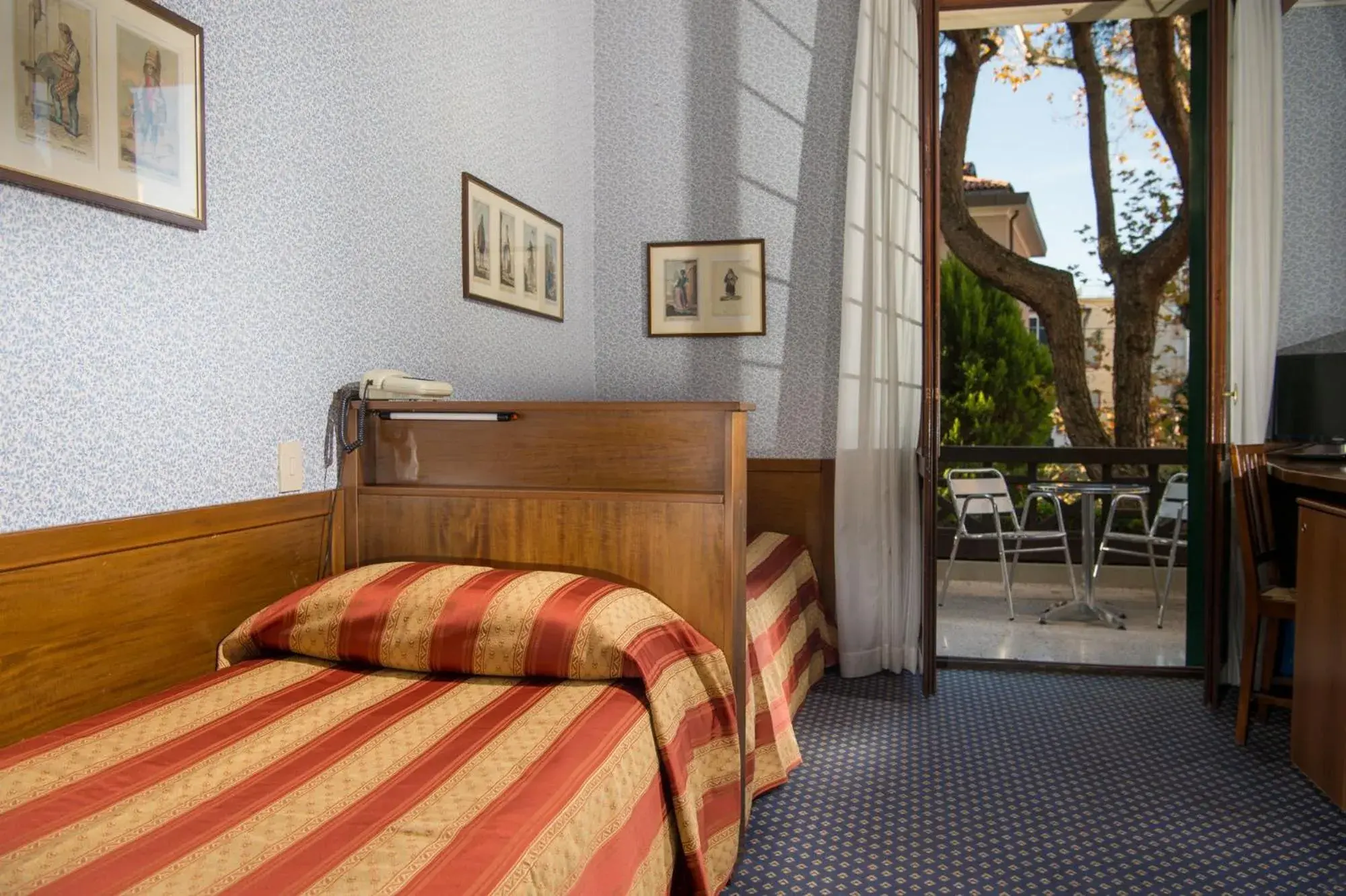 Bed in Hotel La Meridiana