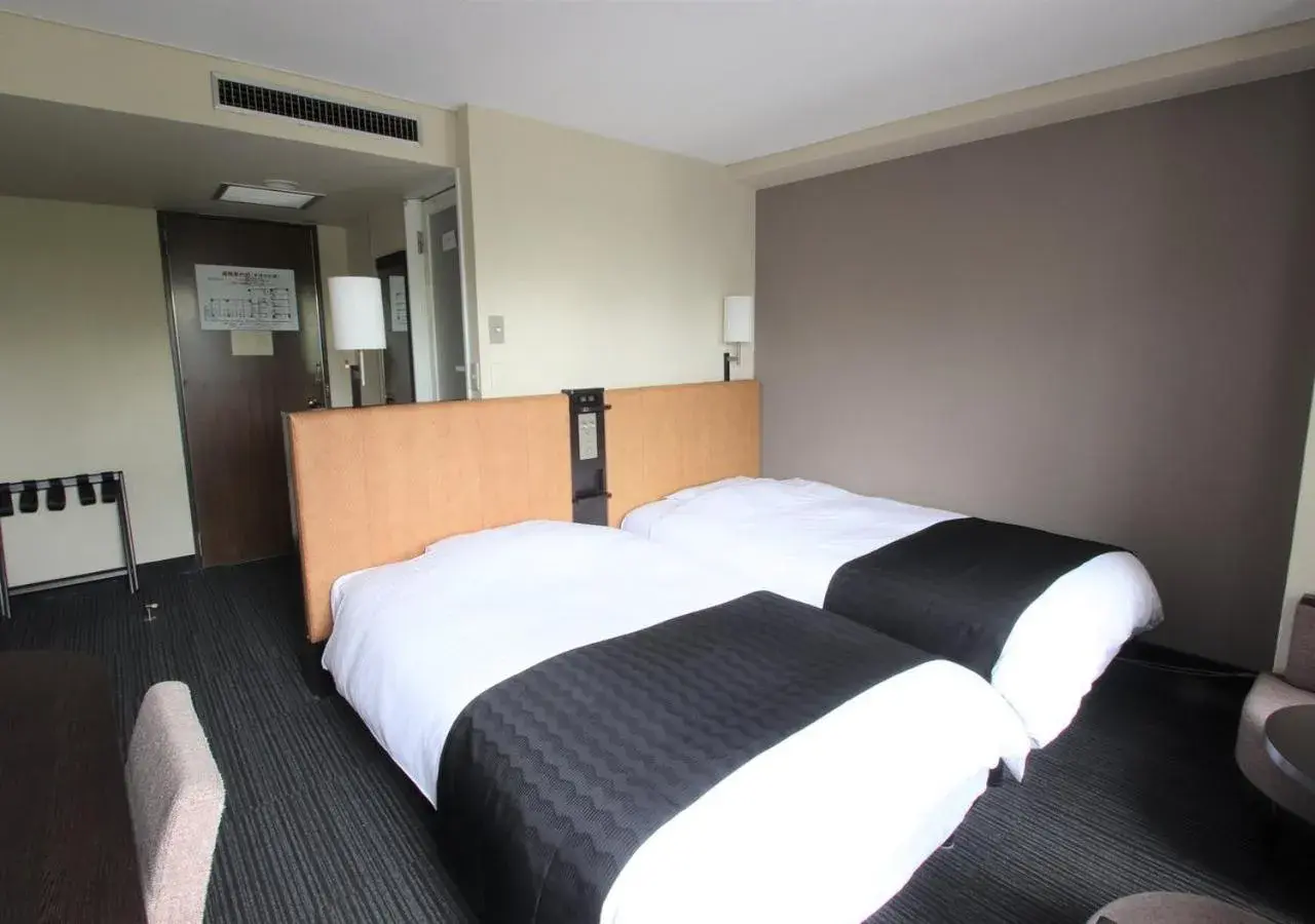 Photo of the whole room, Bed in Apa Hotel Hiroshima-Ekimae