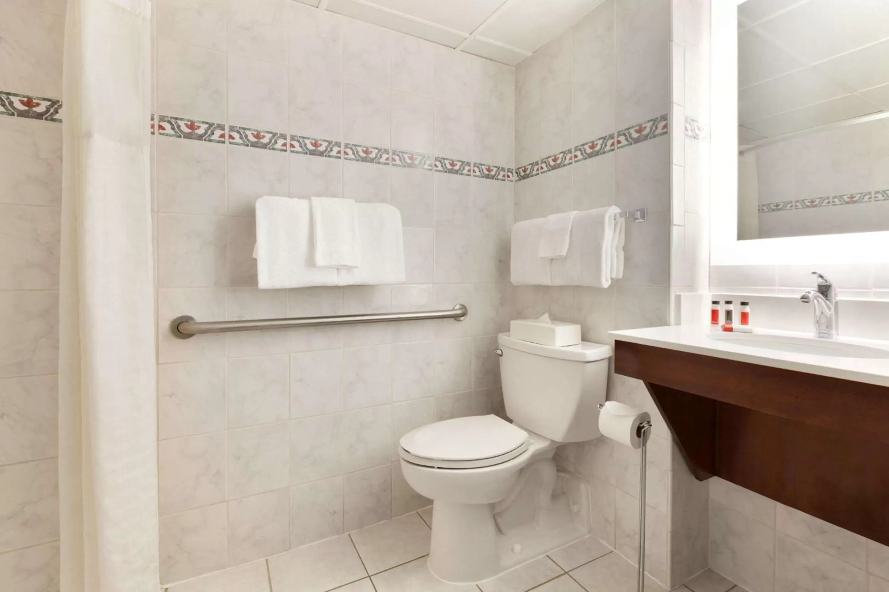 Bathroom in Howard Johnson Plaza by Wyndham Ocean City Oceanfront