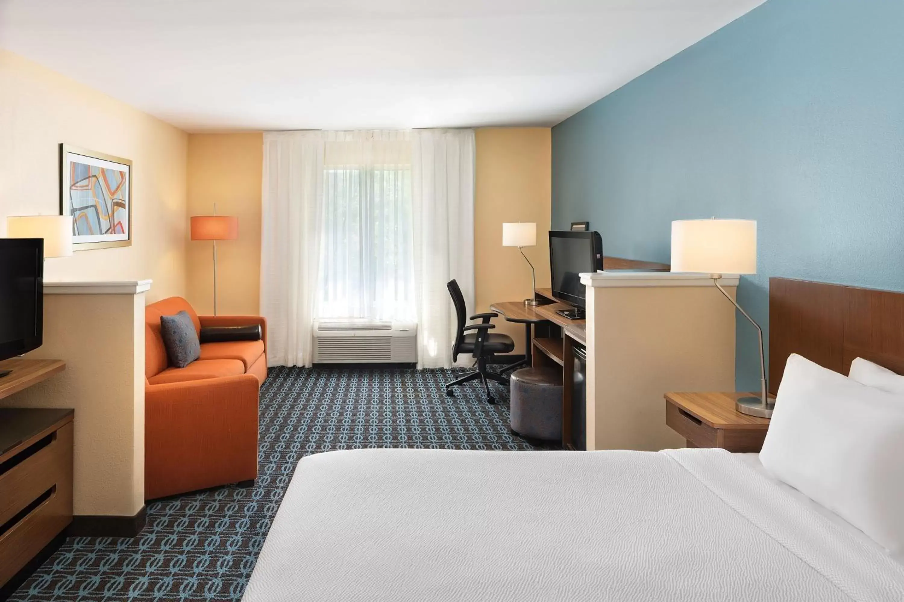 Photo of the whole room, TV/Entertainment Center in Fairfield Inn & Suites Raleigh Durham Airport Research Triangle Park