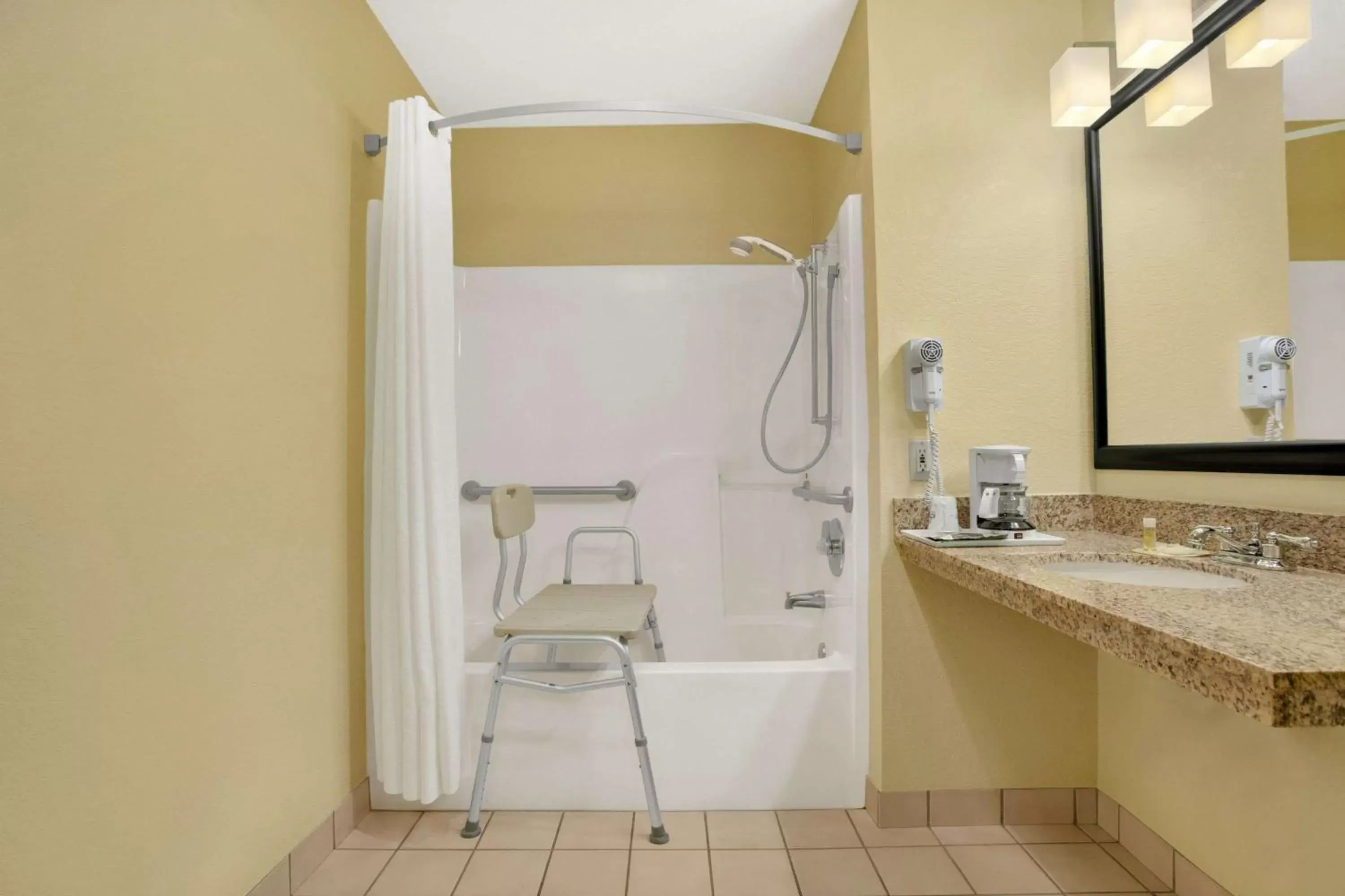 Bathroom in Days Inn by Wyndham Globe