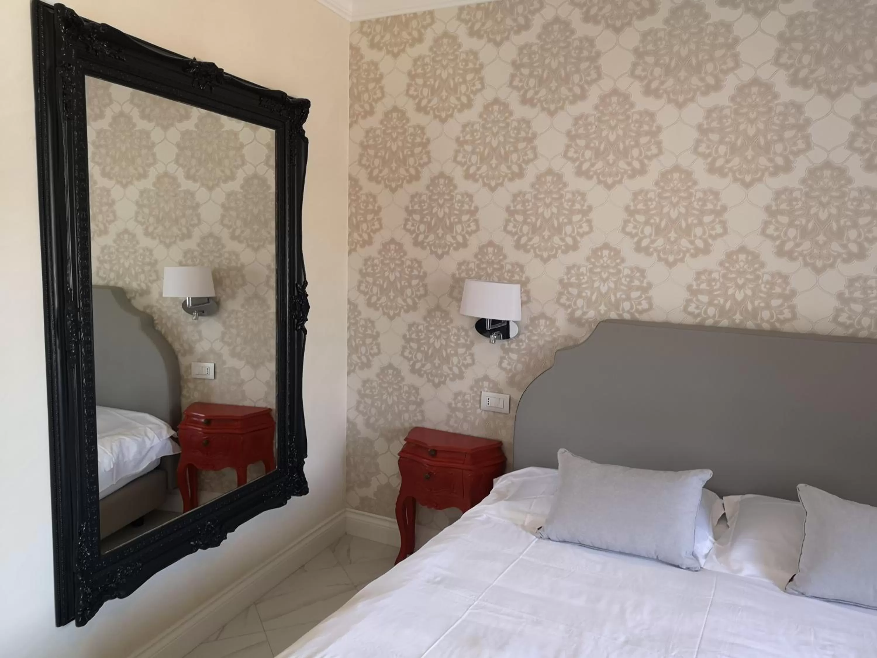 Bed in Altavilla Boutique Hotel